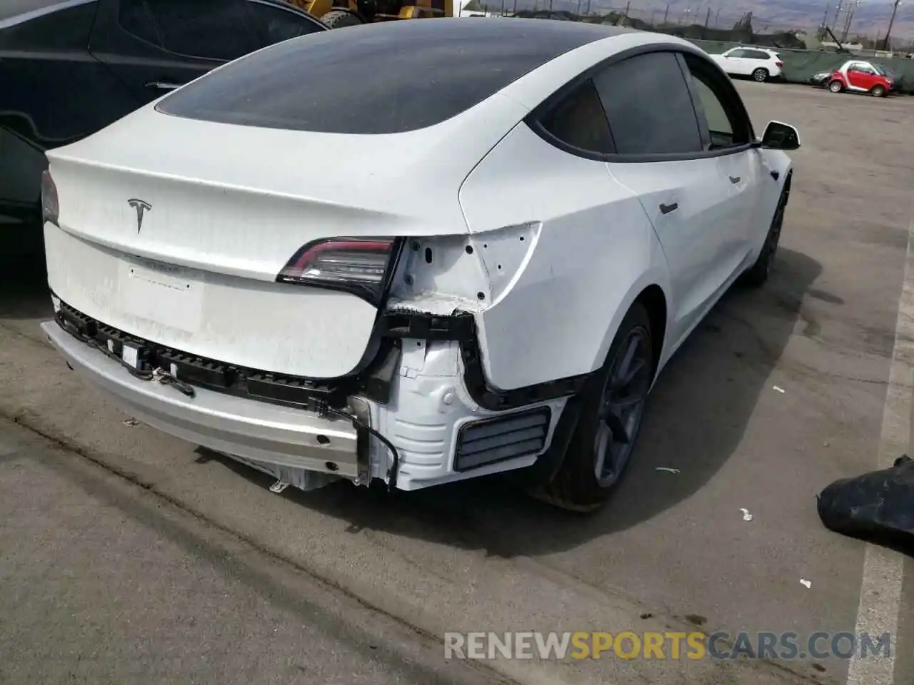 4 Photograph of a damaged car 5YJ3E1EA3MF876980 TESLA MODEL 3 2021