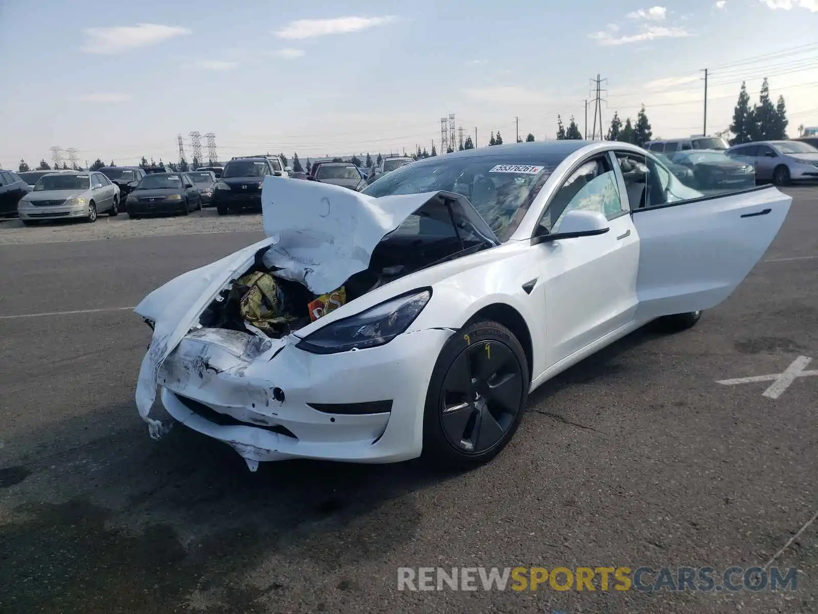 2 Photograph of a damaged car 5YJ3E1EA3MF877885 TESLA MODEL 3 2021