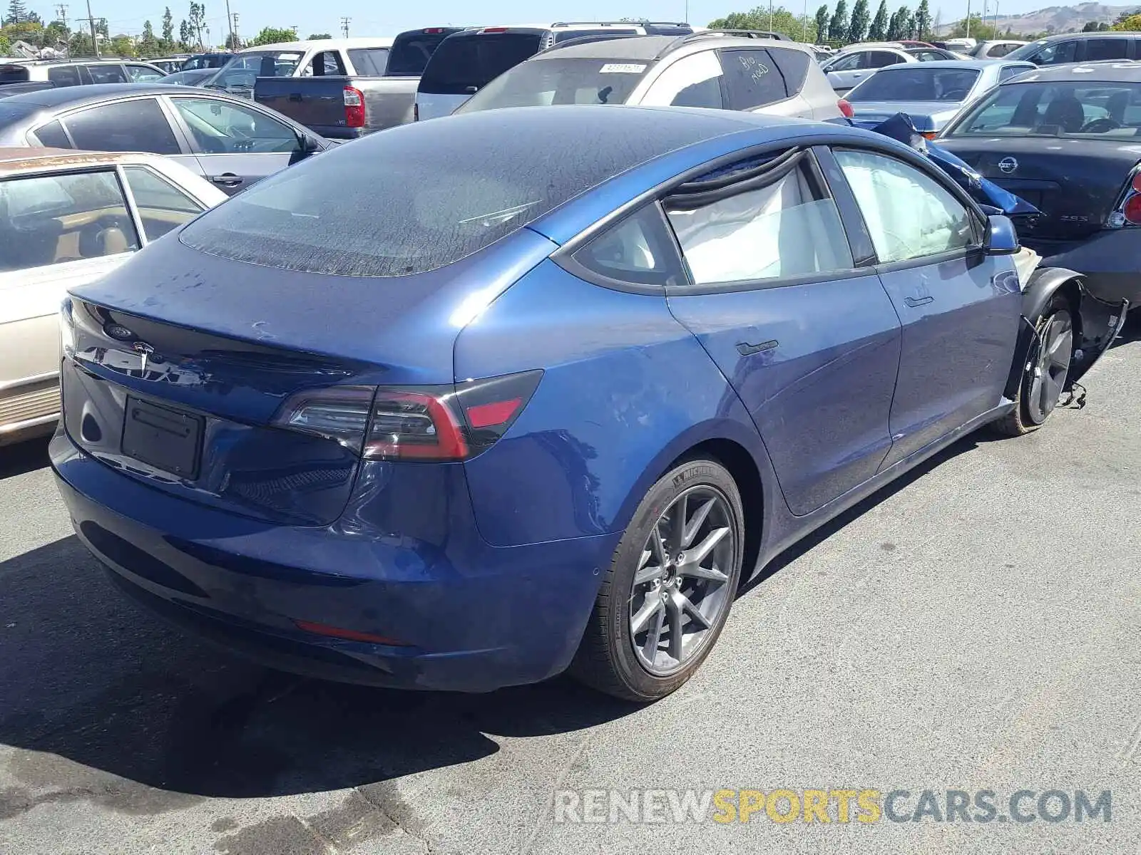 4 Photograph of a damaged car 5YJ3E1EA3MF878826 TESLA MODEL 3 2021