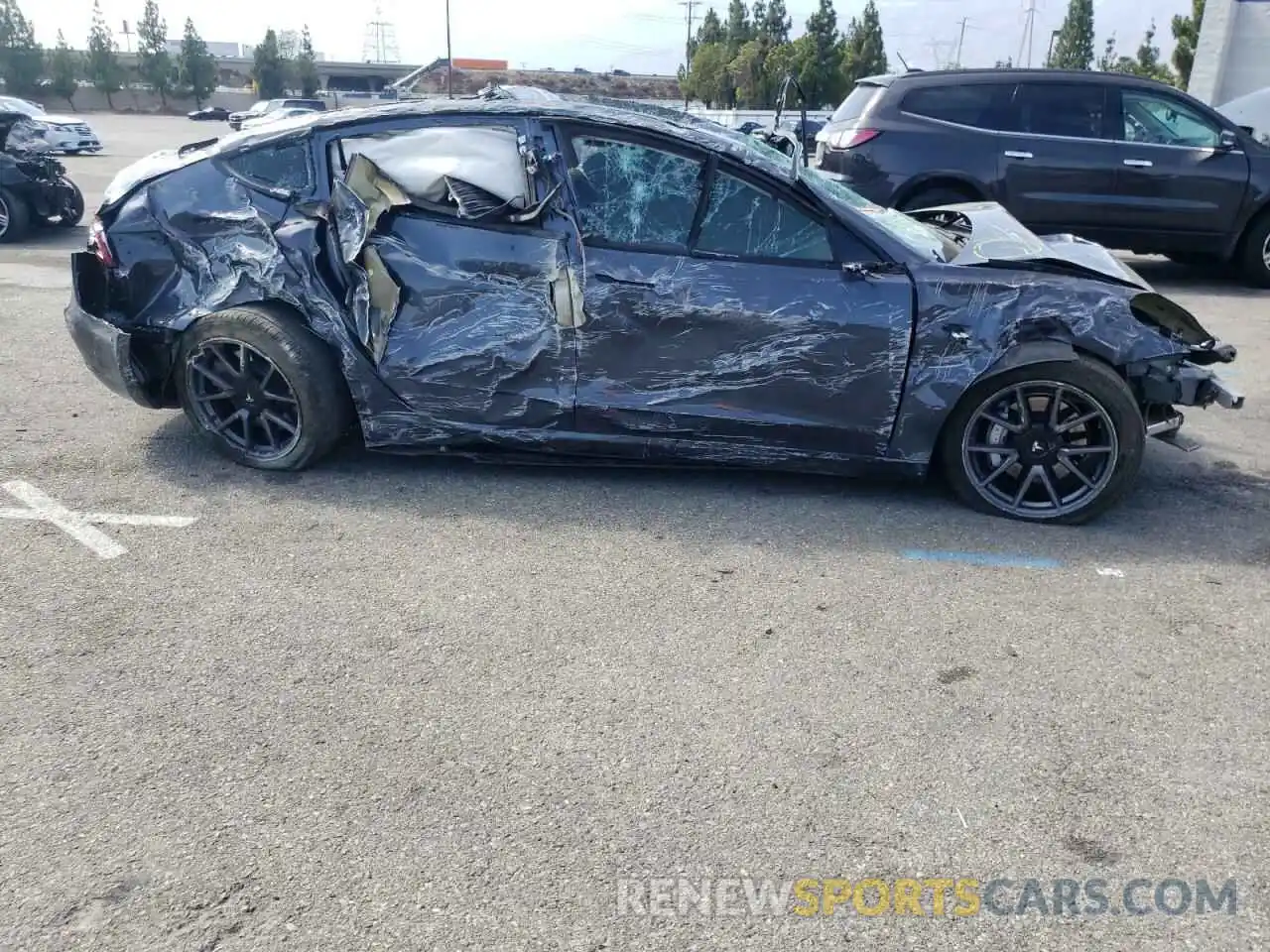 9 Photograph of a damaged car 5YJ3E1EA3MF922033 TESLA MODEL 3 2021