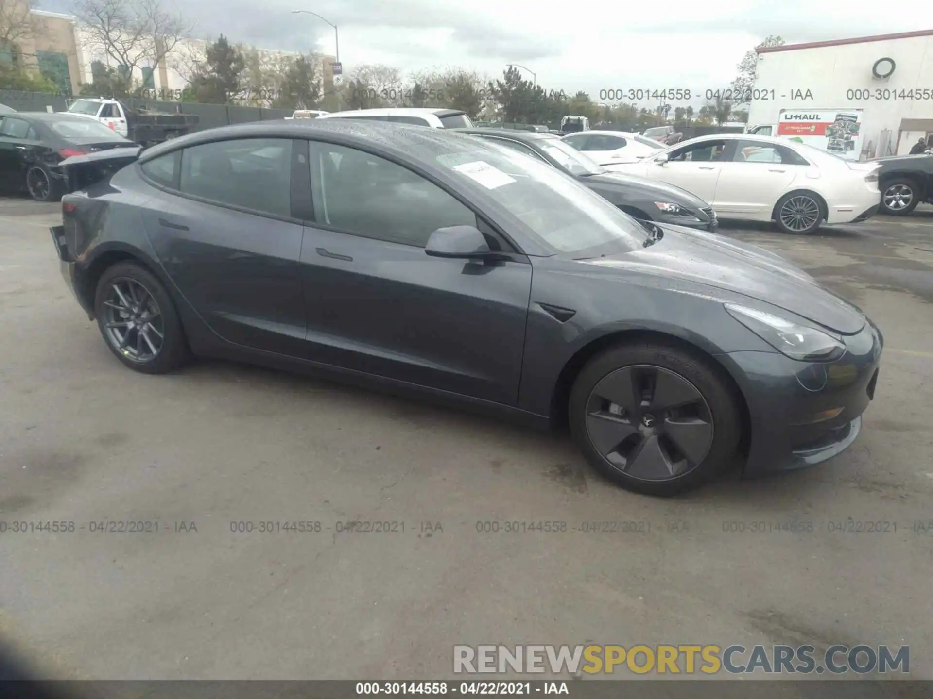 1 Photograph of a damaged car 5YJ3E1EA3MF930181 TESLA MODEL 3 2021