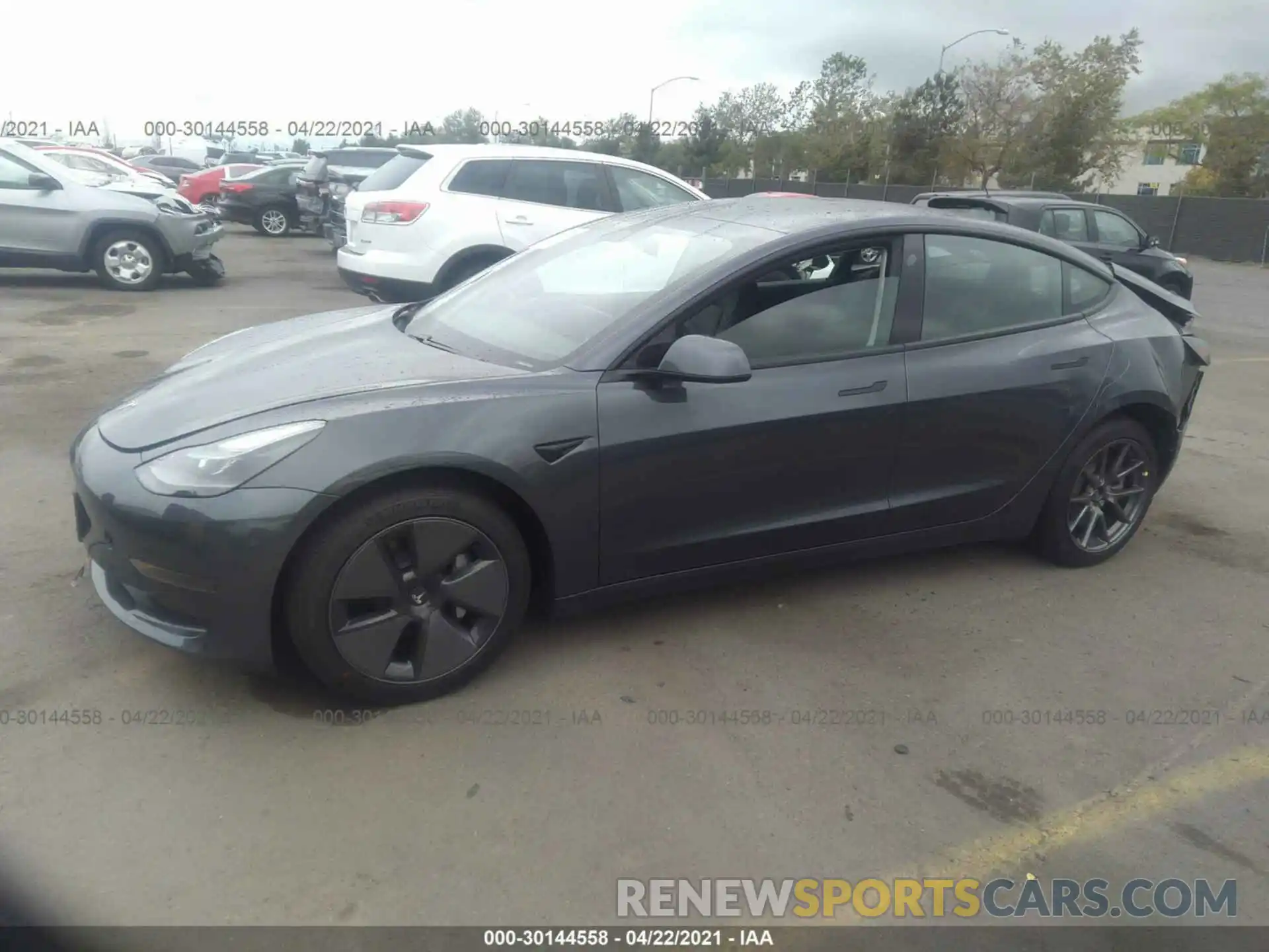 2 Photograph of a damaged car 5YJ3E1EA3MF930181 TESLA MODEL 3 2021