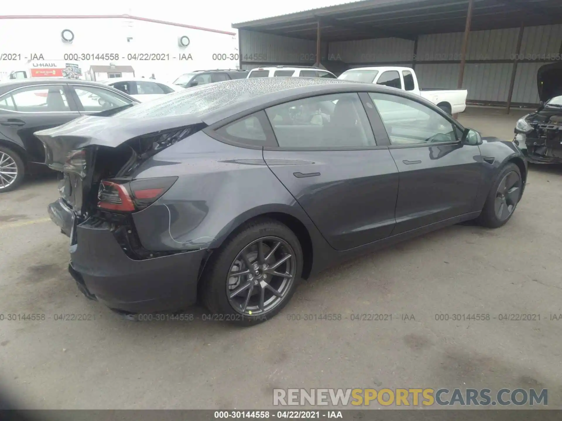 4 Photograph of a damaged car 5YJ3E1EA3MF930181 TESLA MODEL 3 2021