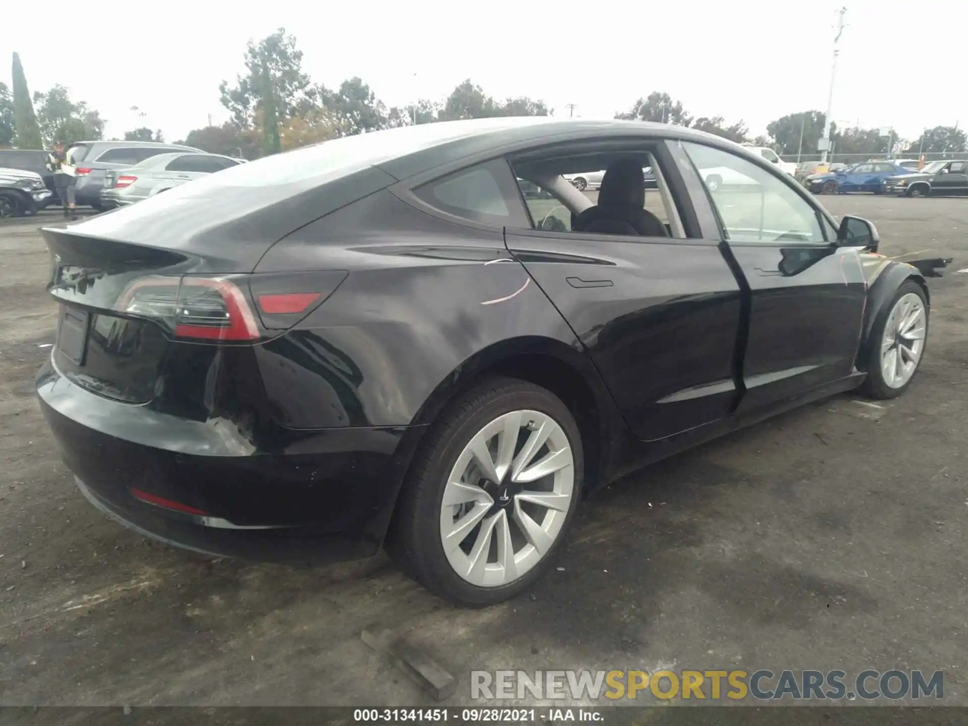 4 Photograph of a damaged car 5YJ3E1EA3MF938927 TESLA MODEL 3 2021