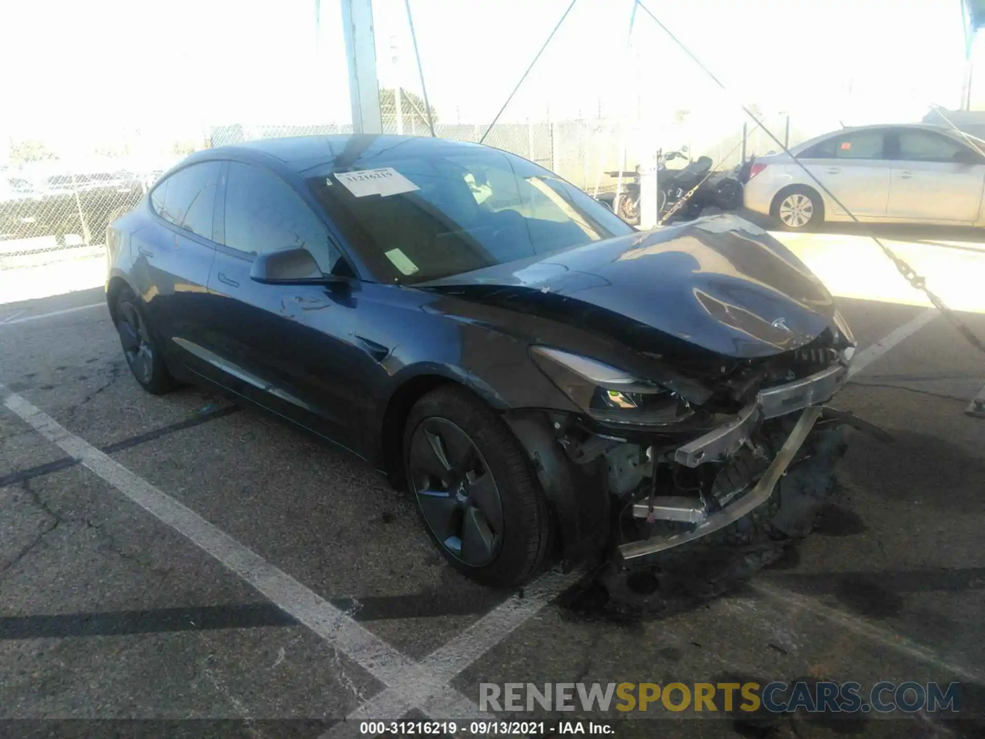 1 Photograph of a damaged car 5YJ3E1EA3MF940094 TESLA MODEL 3 2021