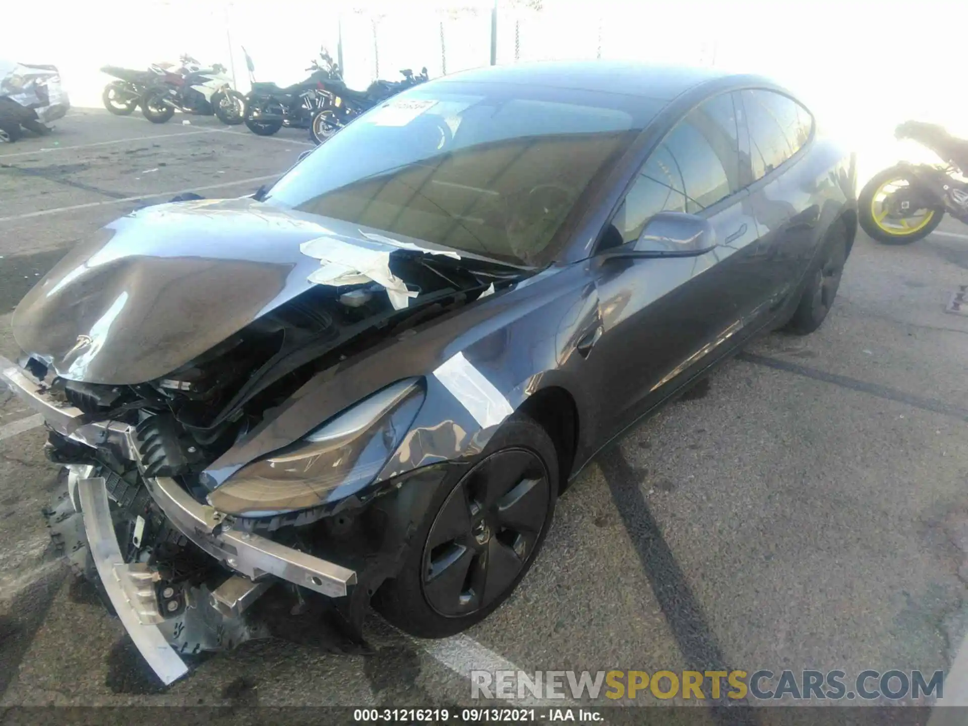 2 Photograph of a damaged car 5YJ3E1EA3MF940094 TESLA MODEL 3 2021