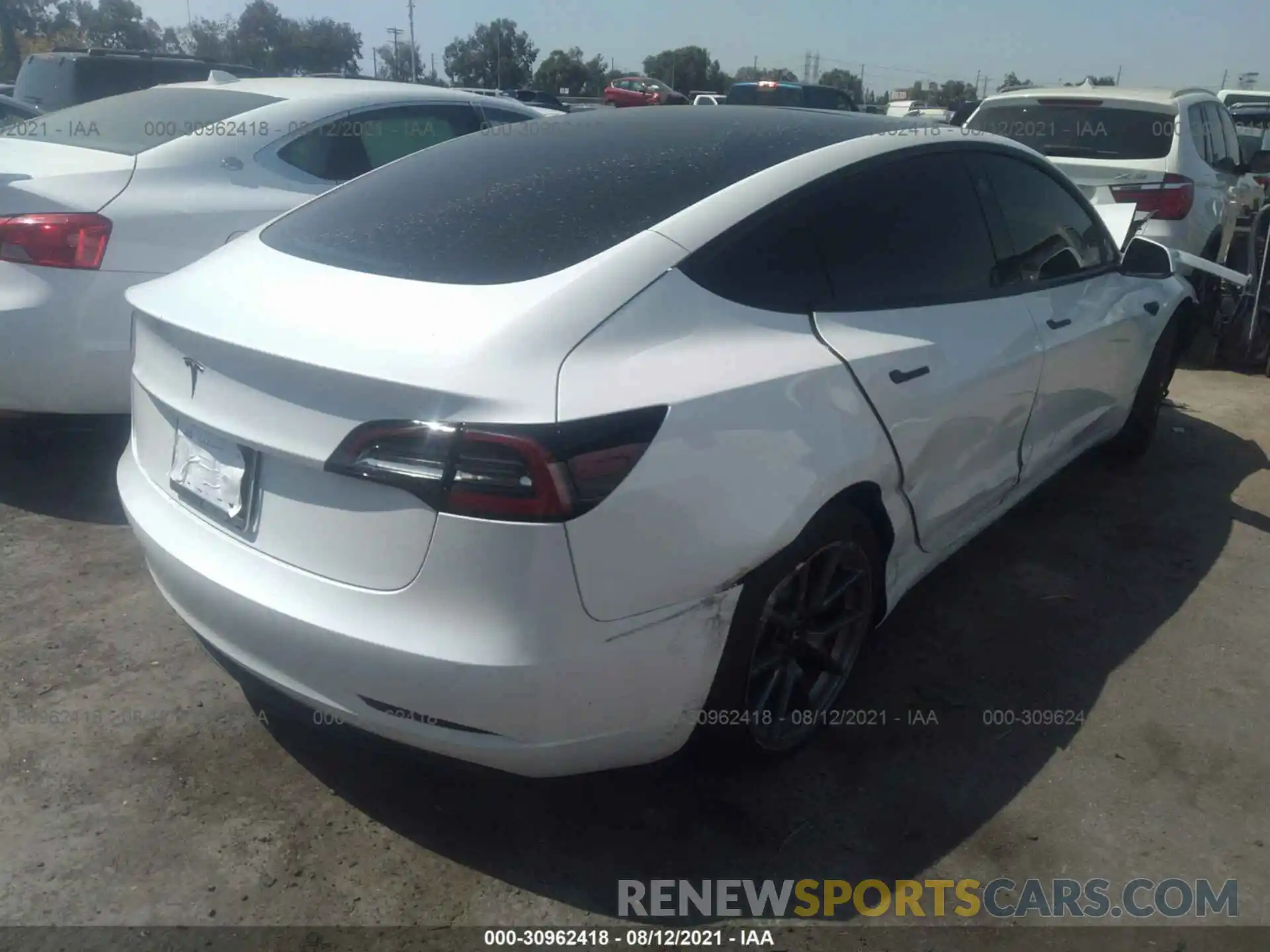 4 Photograph of a damaged car 5YJ3E1EA3MF941620 TESLA MODEL 3 2021