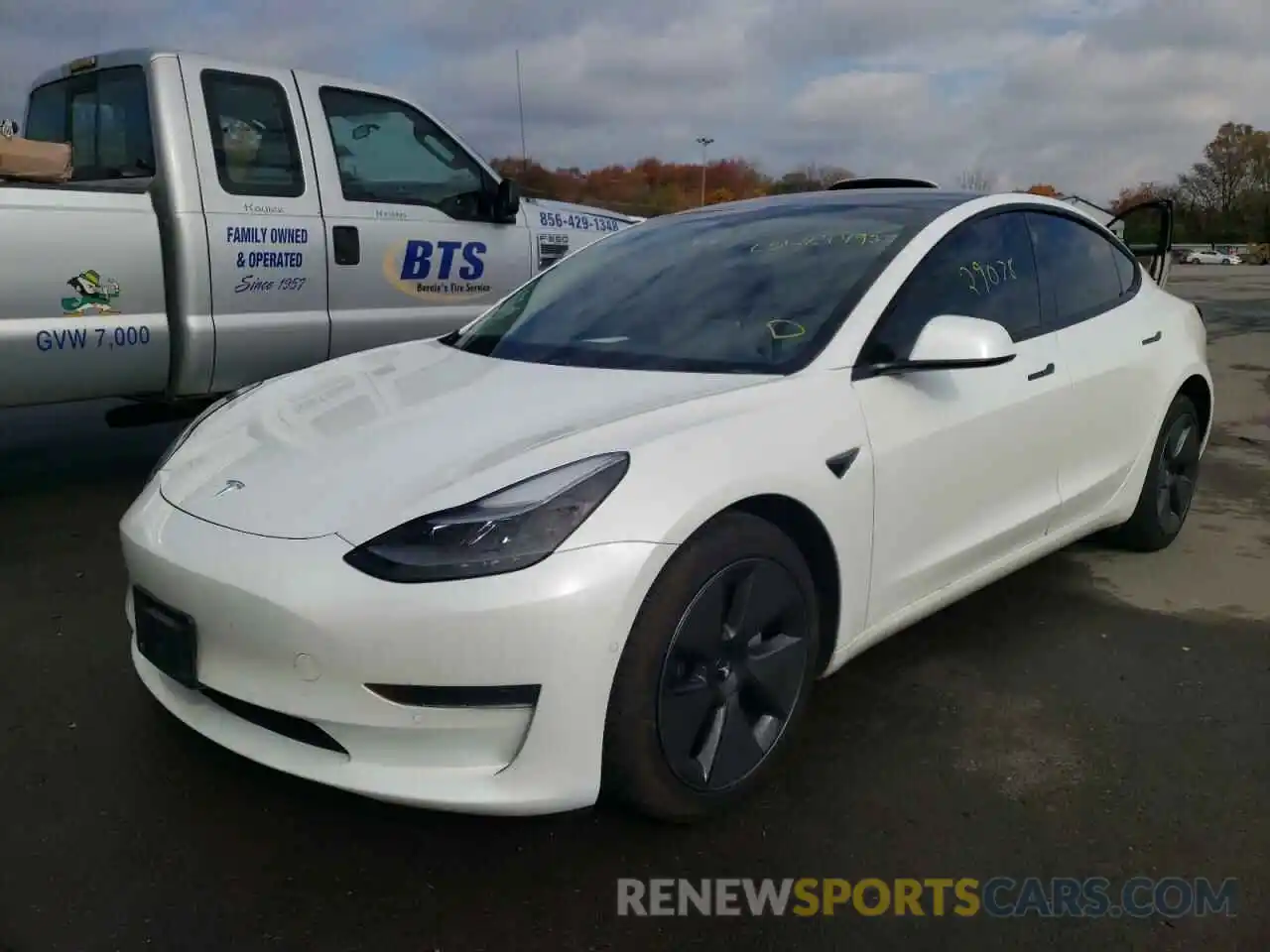 2 Photograph of a damaged car 5YJ3E1EA3MF963648 TESLA MODEL 3 2021