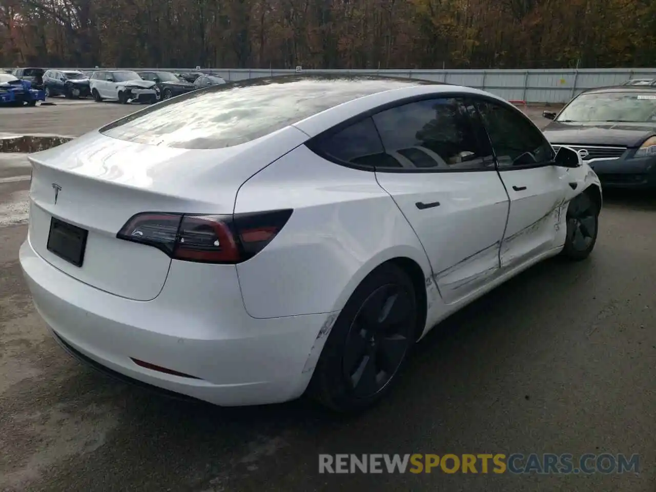 4 Photograph of a damaged car 5YJ3E1EA3MF963648 TESLA MODEL 3 2021