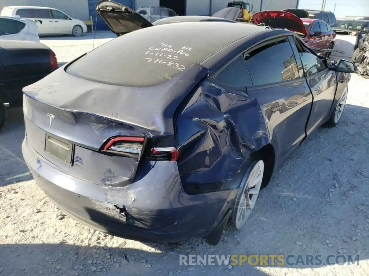 4 Photograph of a damaged car 5YJ3E1EA3MF977758 TESLA MODEL 3 2021