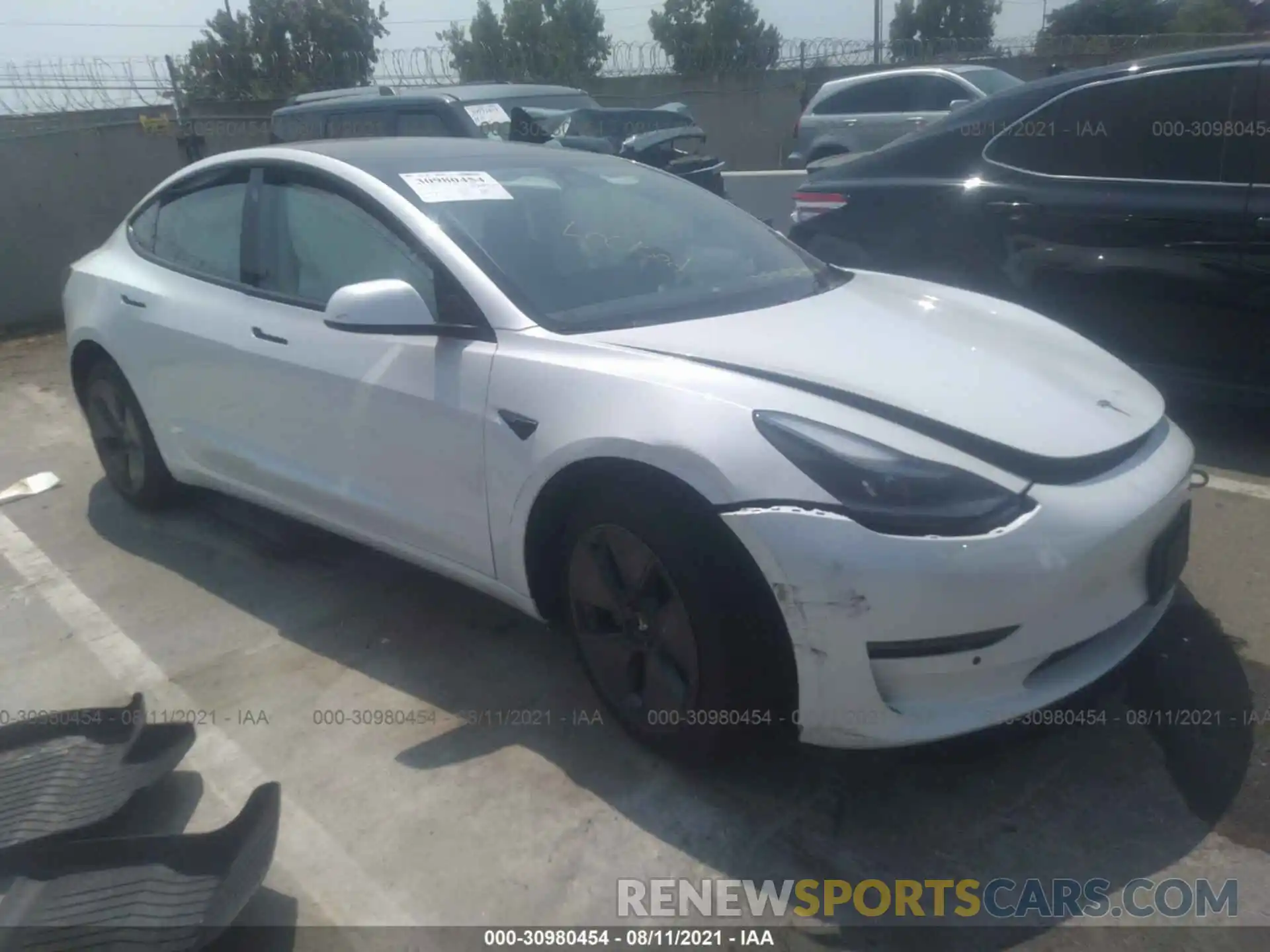 1 Photograph of a damaged car 5YJ3E1EA3MF986363 TESLA MODEL 3 2021