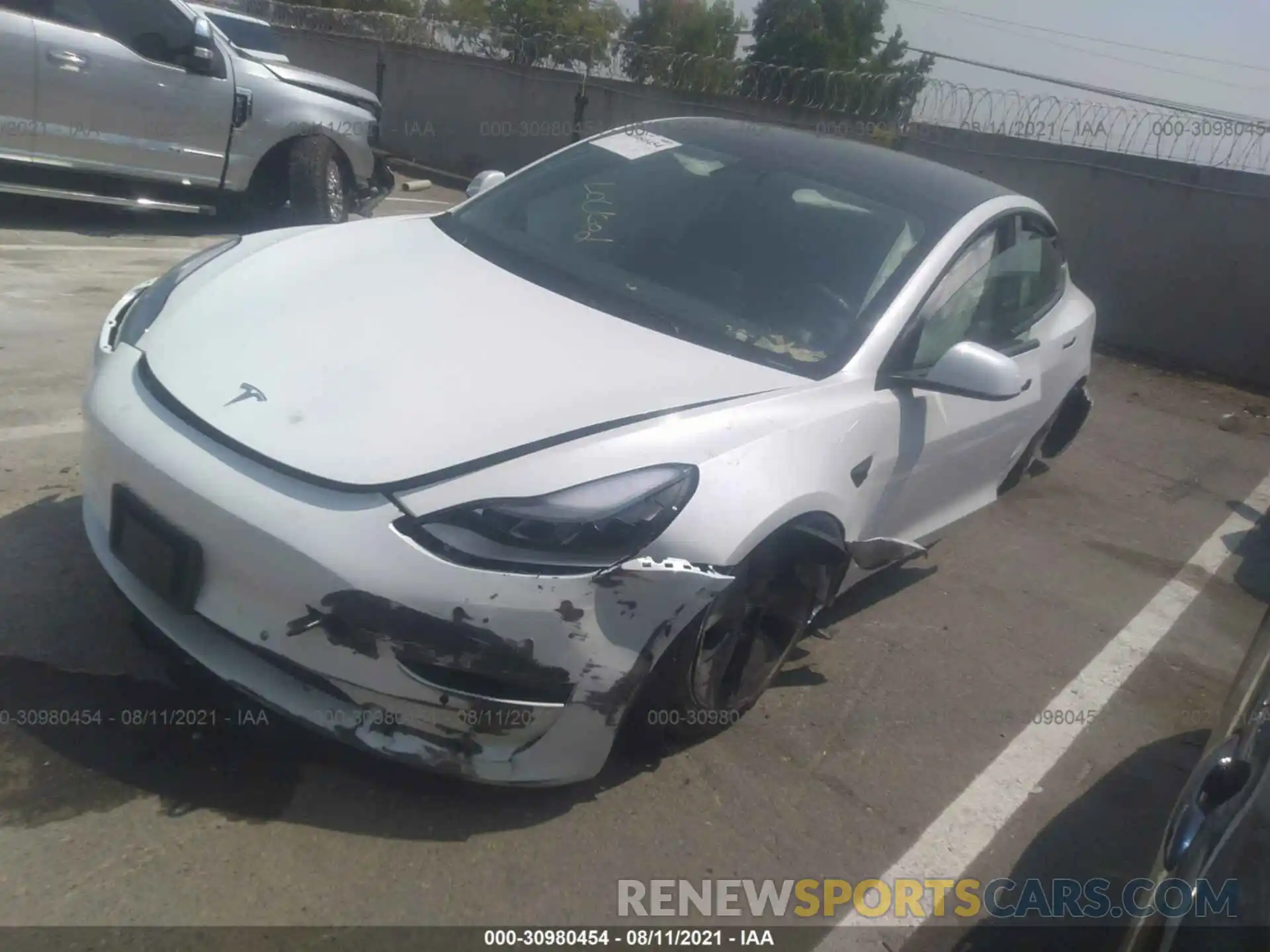 2 Photograph of a damaged car 5YJ3E1EA3MF986363 TESLA MODEL 3 2021