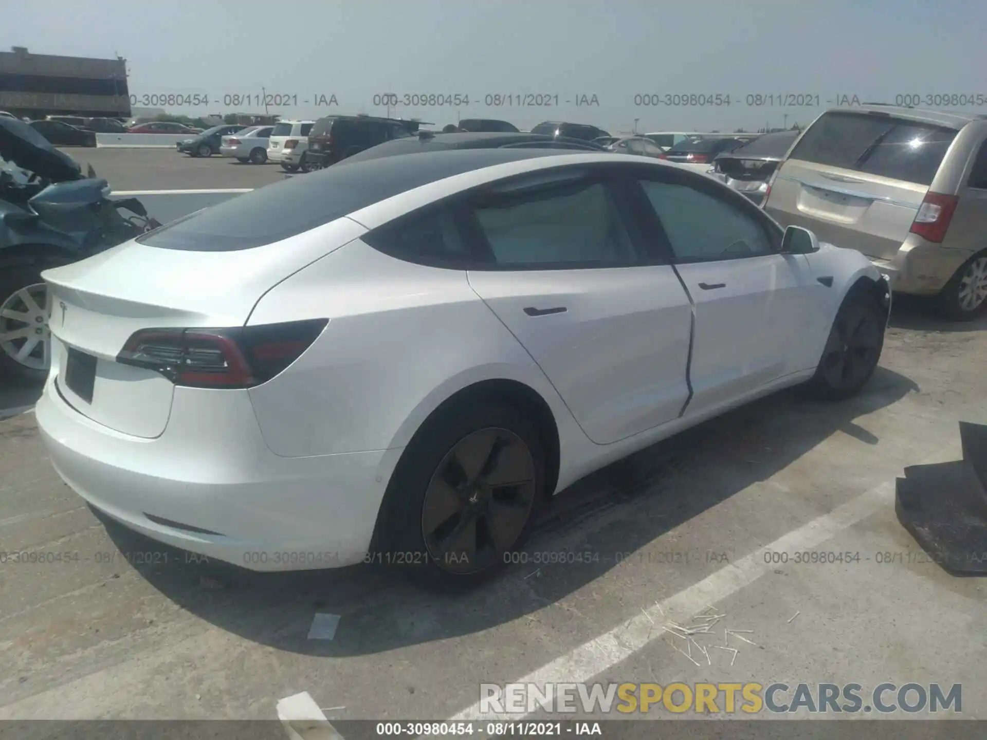 4 Фотография поврежденного автомобиля 5YJ3E1EA3MF986363 TESLA MODEL 3 2021