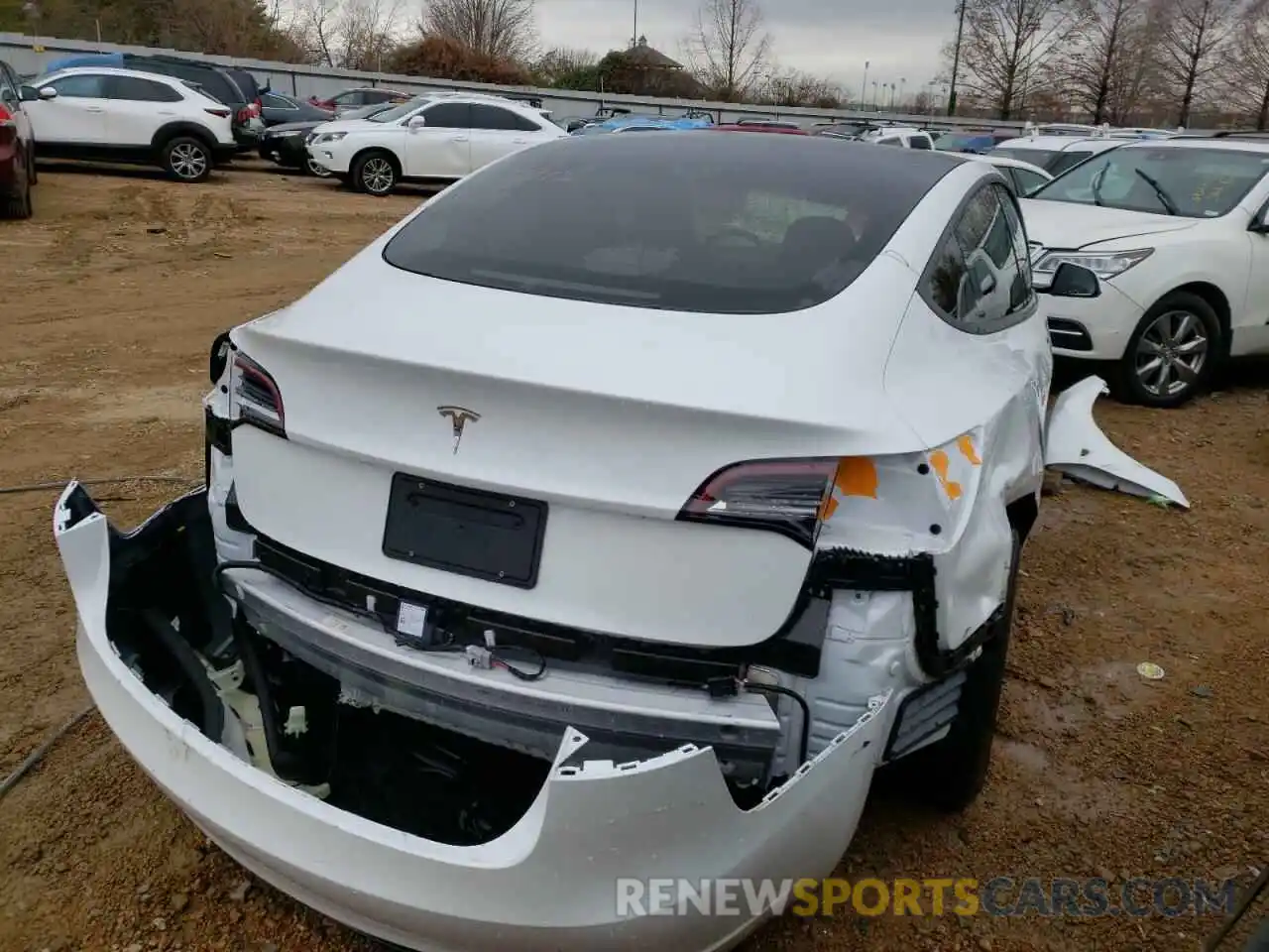 4 Photograph of a damaged car 5YJ3E1EA4MF009488 TESLA MODEL 3 2021