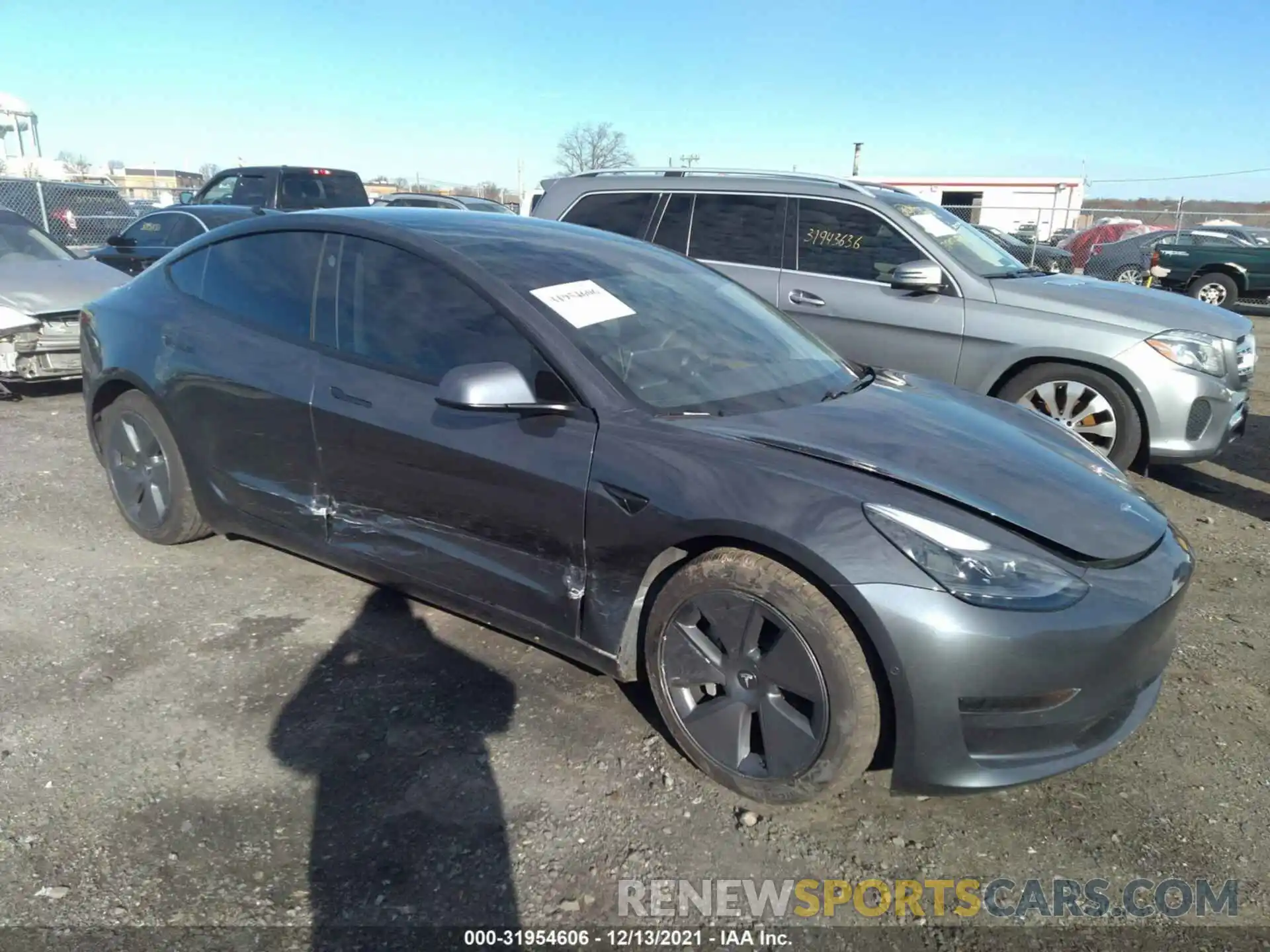 1 Photograph of a damaged car 5YJ3E1EA4MF017638 TESLA MODEL 3 2021