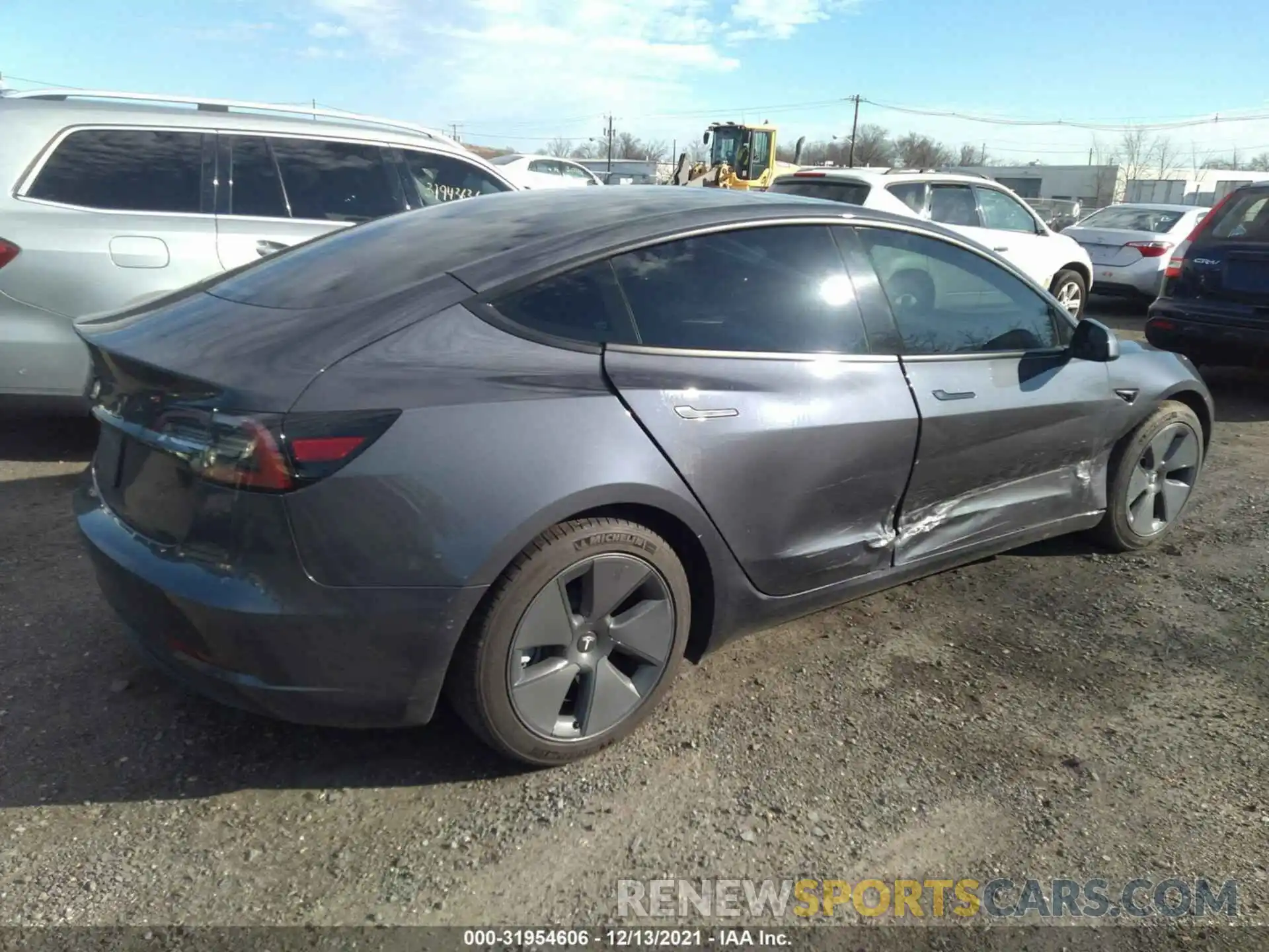 4 Photograph of a damaged car 5YJ3E1EA4MF017638 TESLA MODEL 3 2021