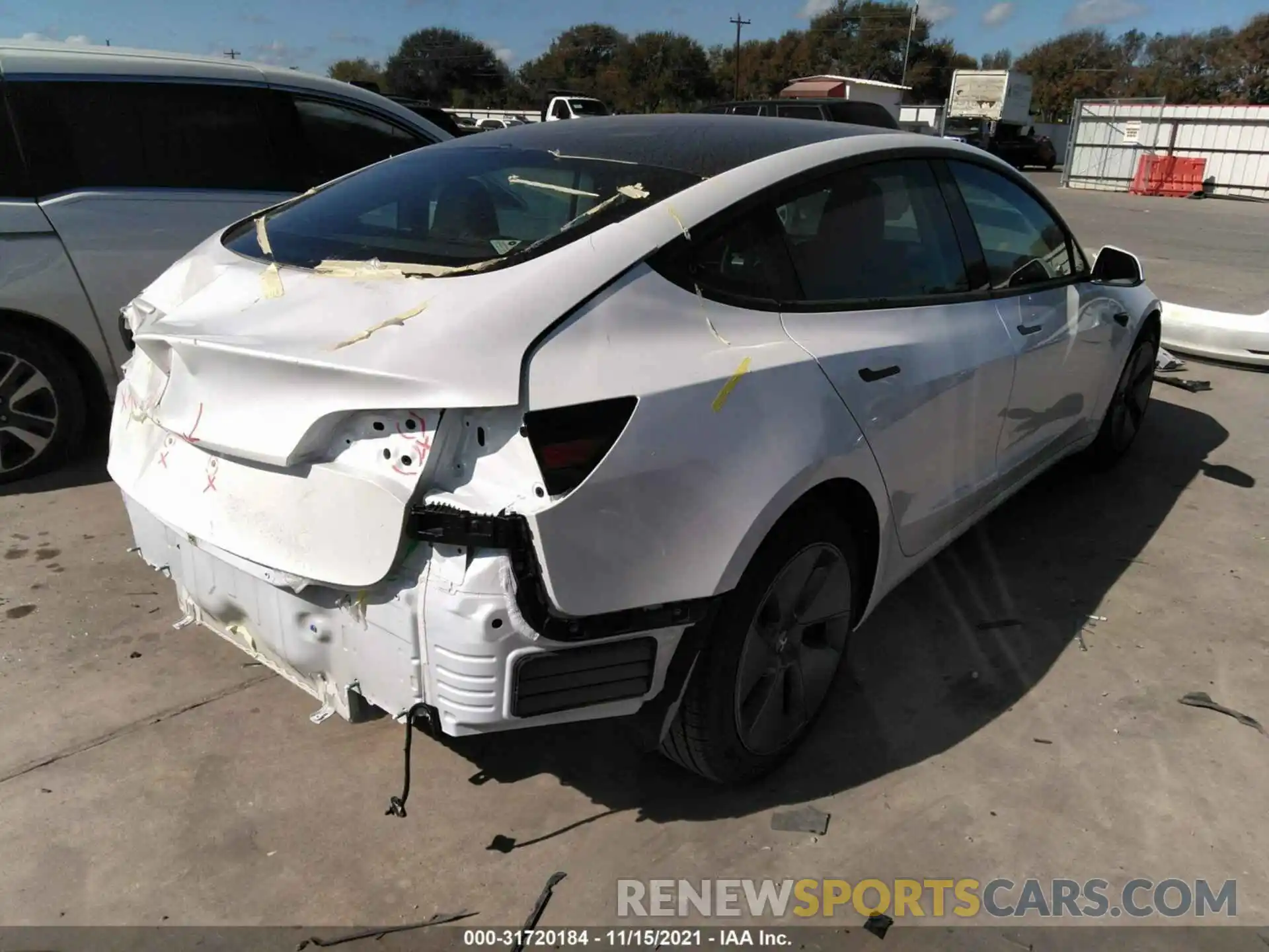 4 Photograph of a damaged car 5YJ3E1EA4MF031703 TESLA MODEL 3 2021