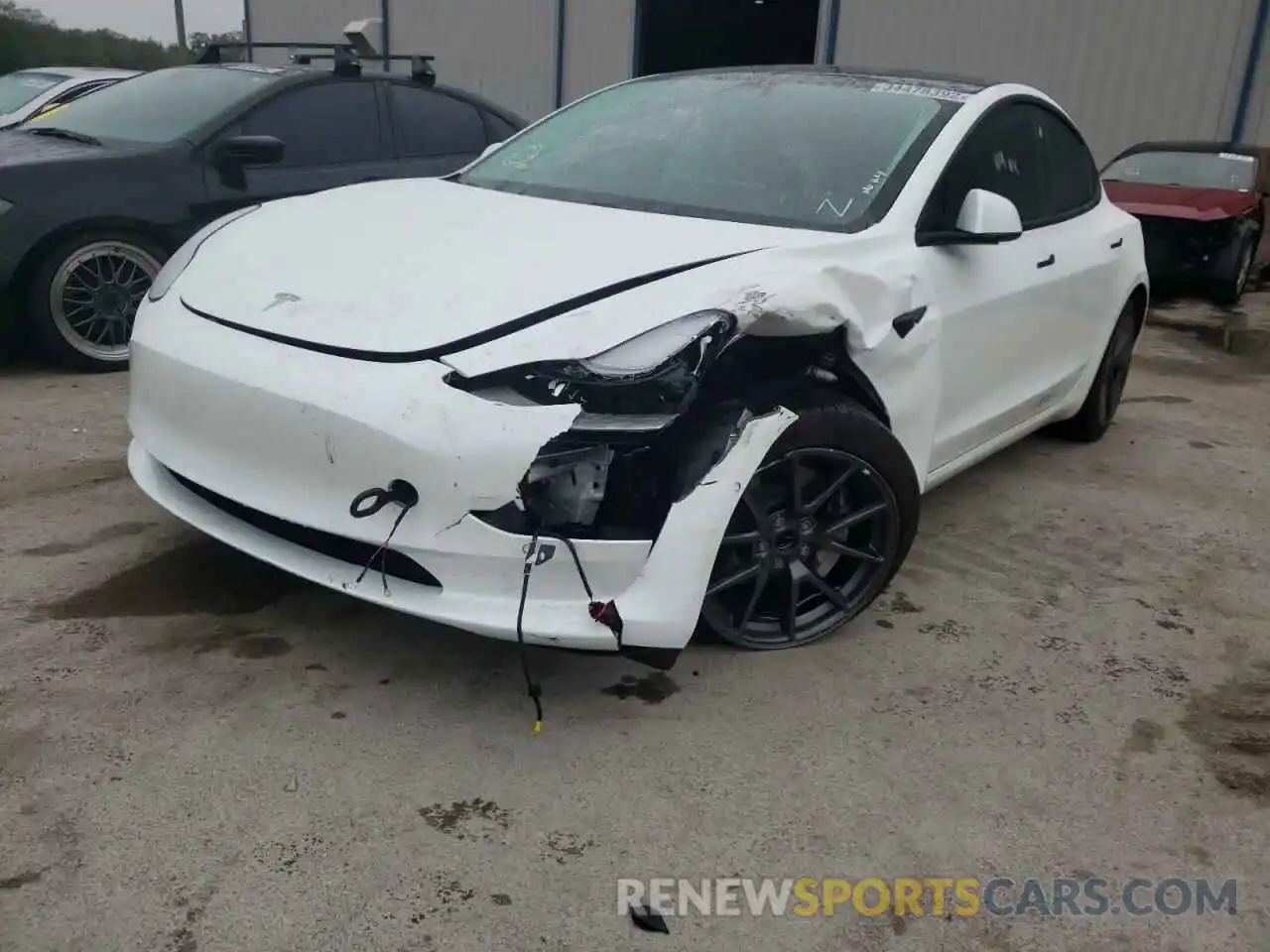 2 Photograph of a damaged car 5YJ3E1EA4MF046945 TESLA MODEL 3 2021