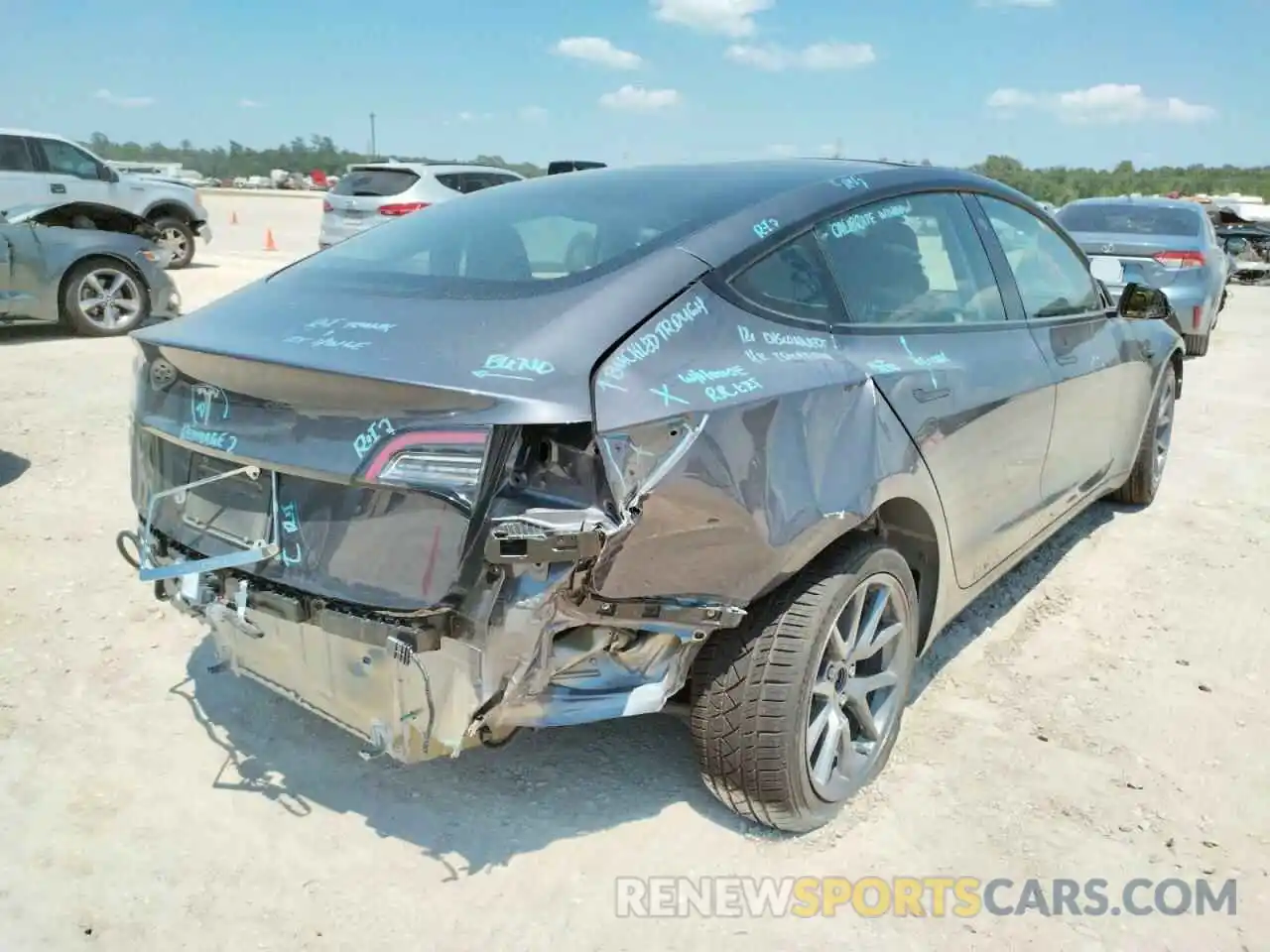 4 Photograph of a damaged car 5YJ3E1EA4MF085597 TESLA MODEL 3 2021