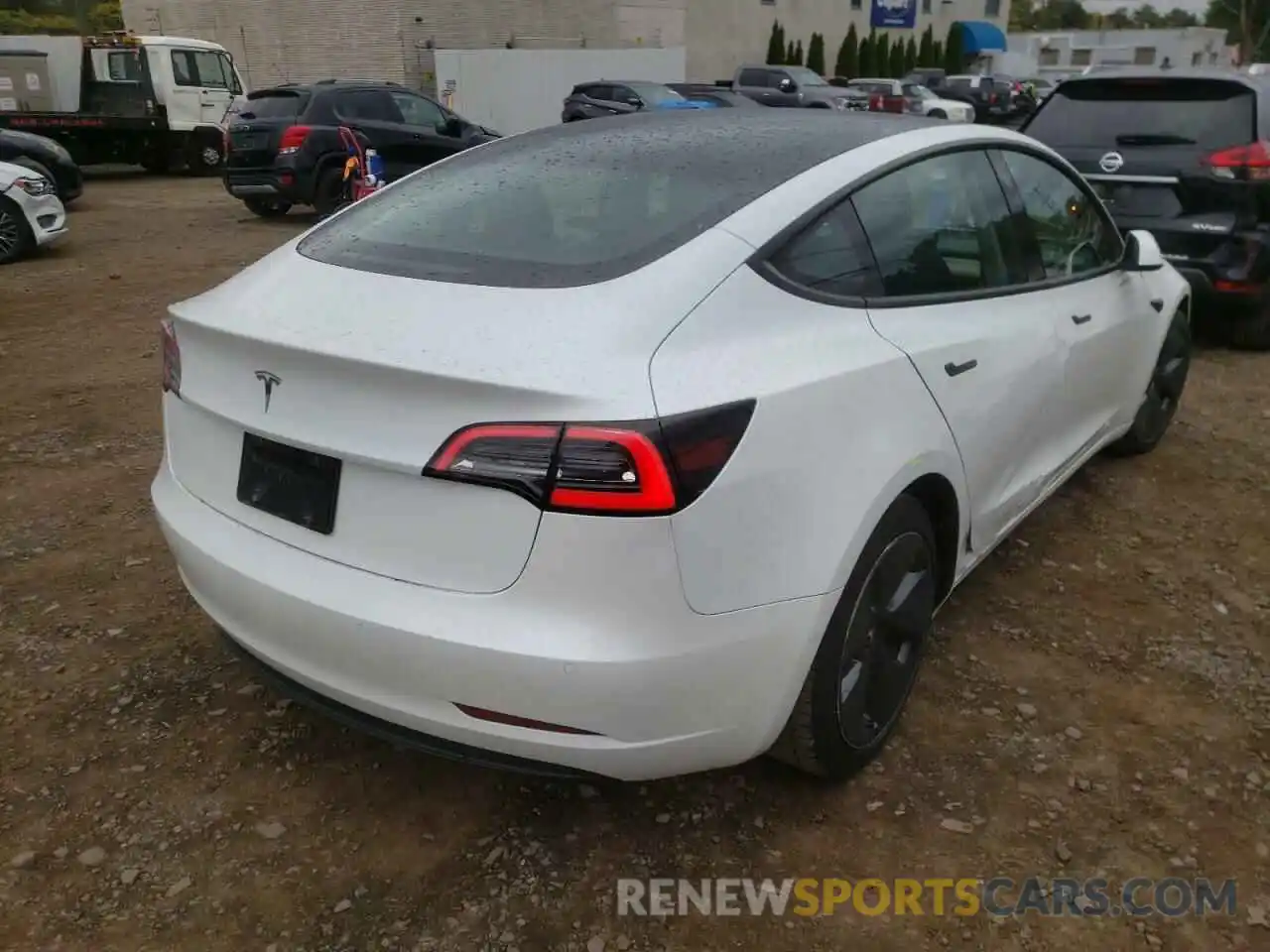 4 Photograph of a damaged car 5YJ3E1EA4MF090668 TESLA MODEL 3 2021