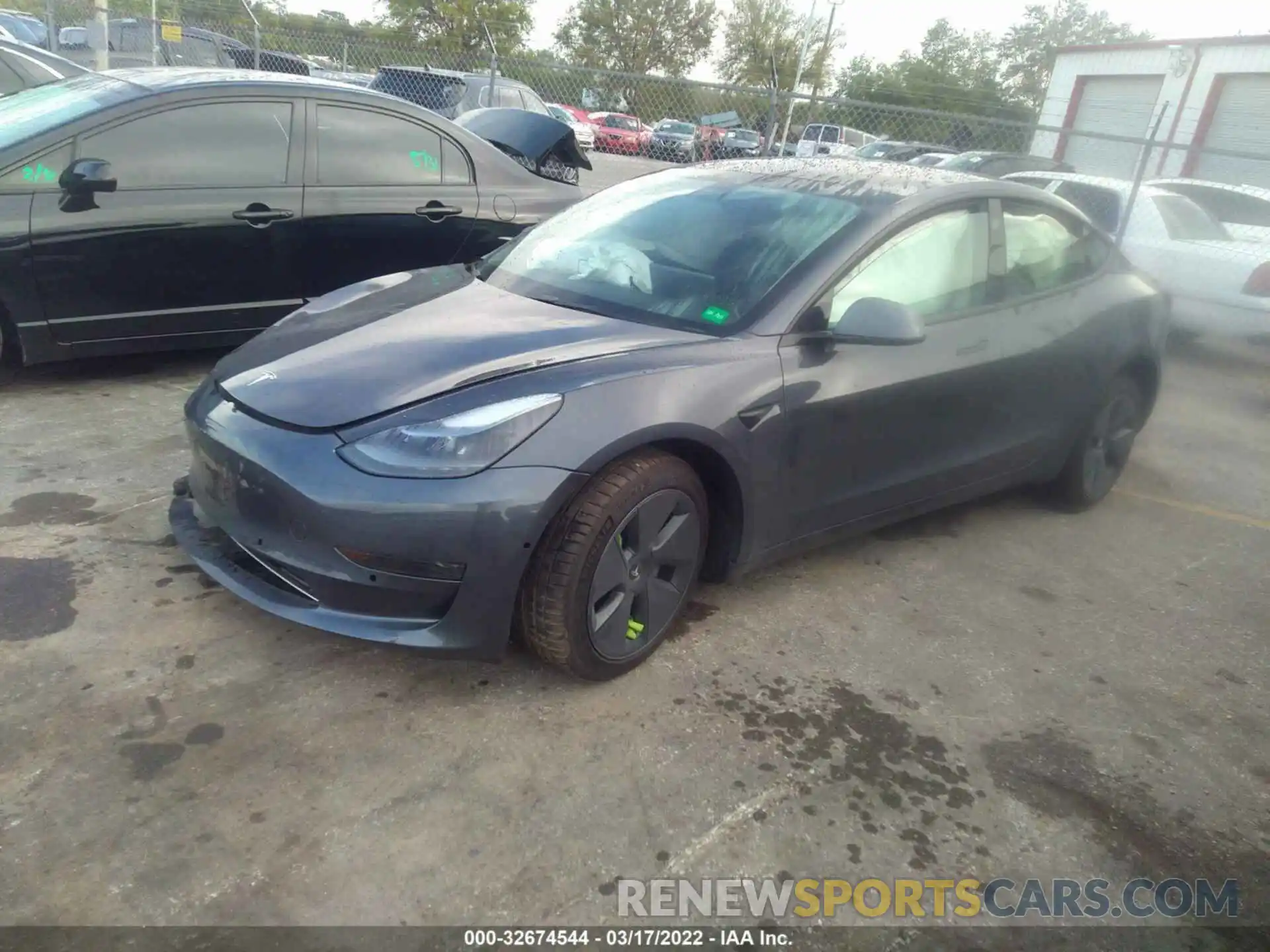 2 Photograph of a damaged car 5YJ3E1EA4MF098124 TESLA MODEL 3 2021