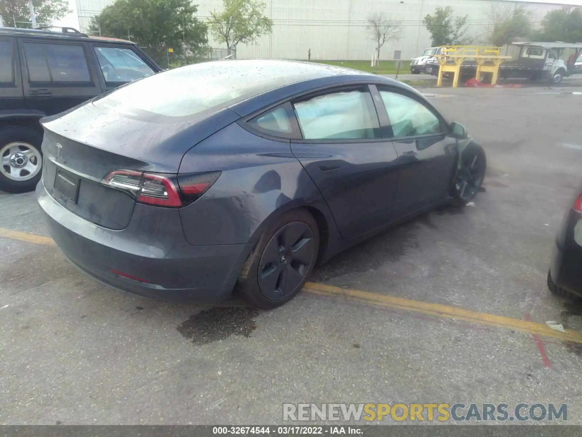 4 Photograph of a damaged car 5YJ3E1EA4MF098124 TESLA MODEL 3 2021