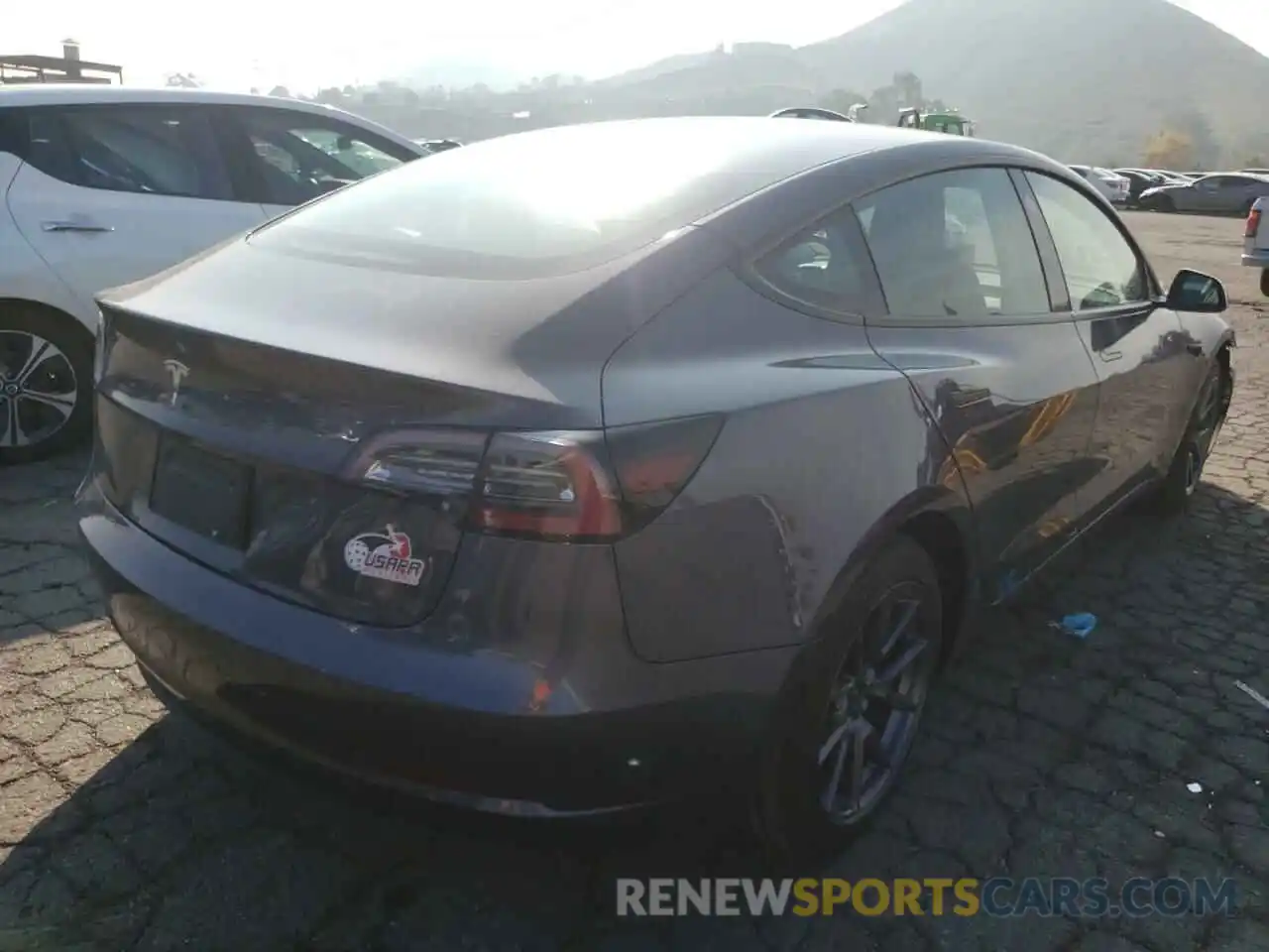 4 Photograph of a damaged car 5YJ3E1EA4MF100485 TESLA MODEL 3 2021