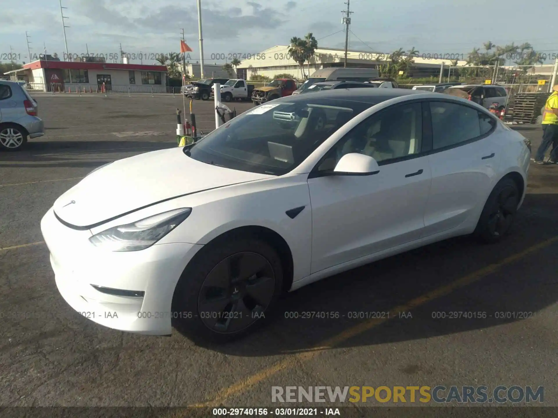 2 Photograph of a damaged car 5YJ3E1EA4MF852025 TESLA MODEL 3 2021