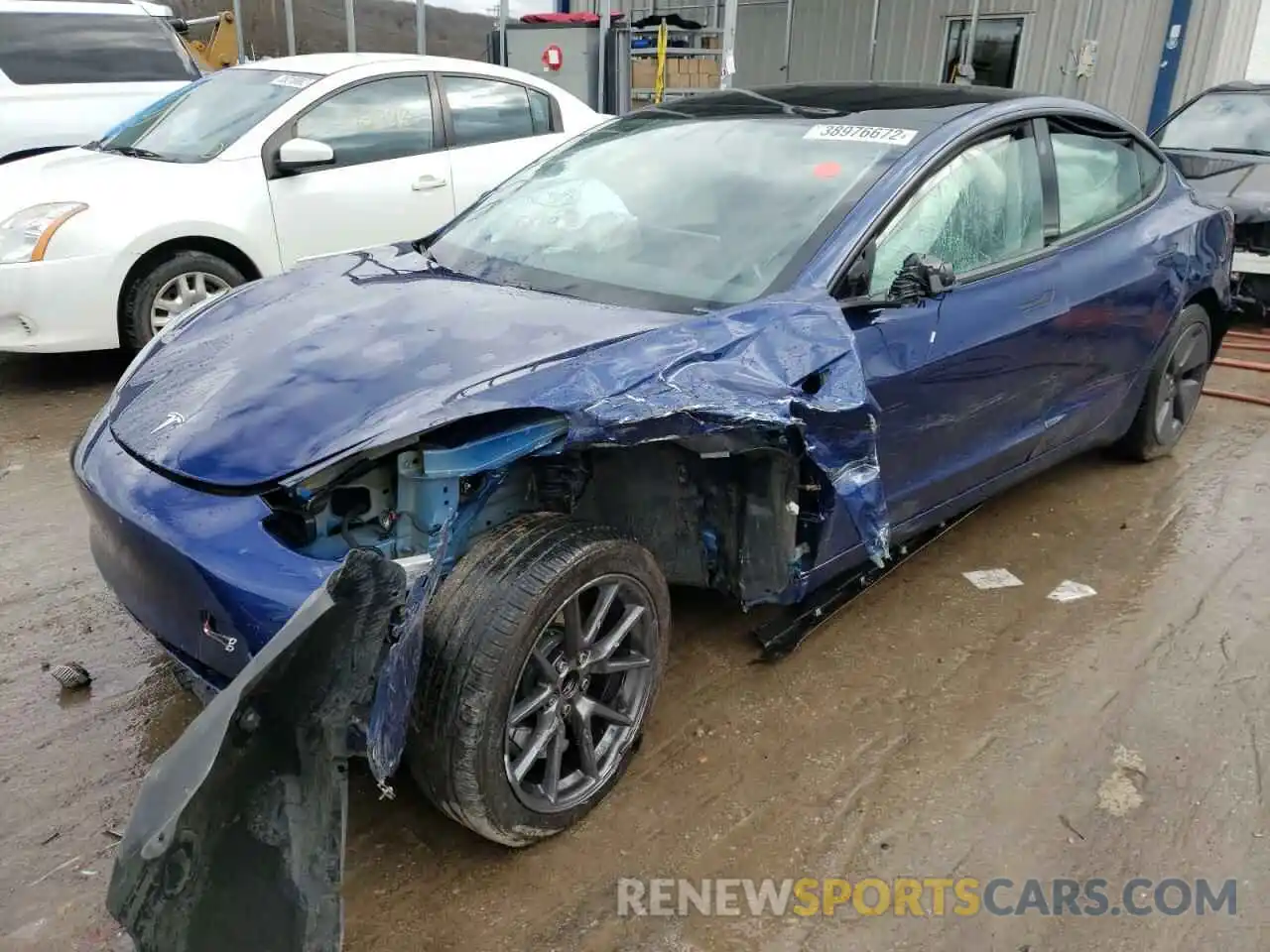 2 Photograph of a damaged car 5YJ3E1EA4MF853580 TESLA MODEL 3 2021