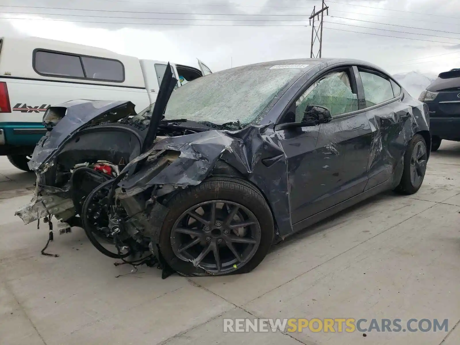 2 Photograph of a damaged car 5YJ3E1EA4MF858648 TESLA MODEL 3 2021