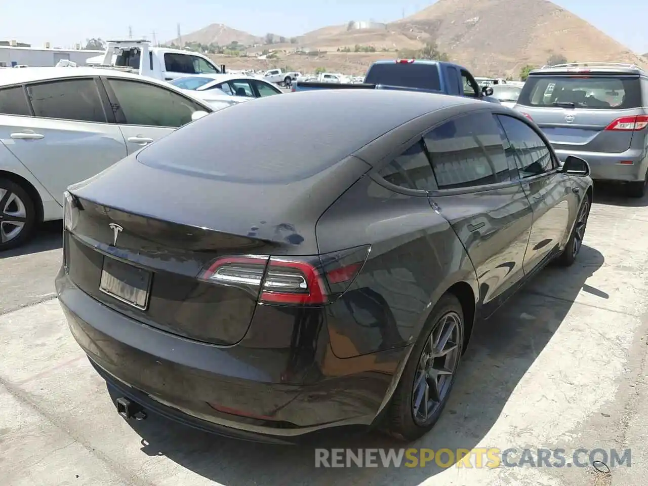 4 Photograph of a damaged car 5YJ3E1EA4MF861615 TESLA MODEL 3 2021