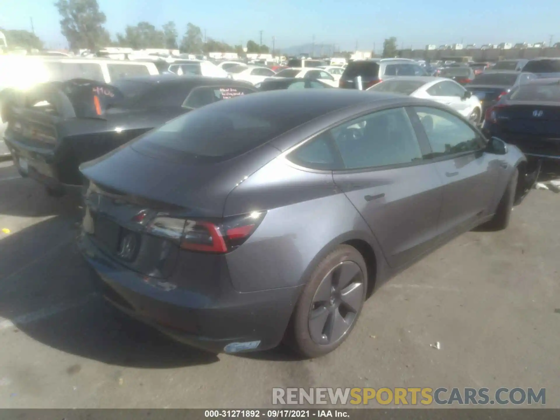 4 Photograph of a damaged car 5YJ3E1EA4MF867589 TESLA MODEL 3 2021