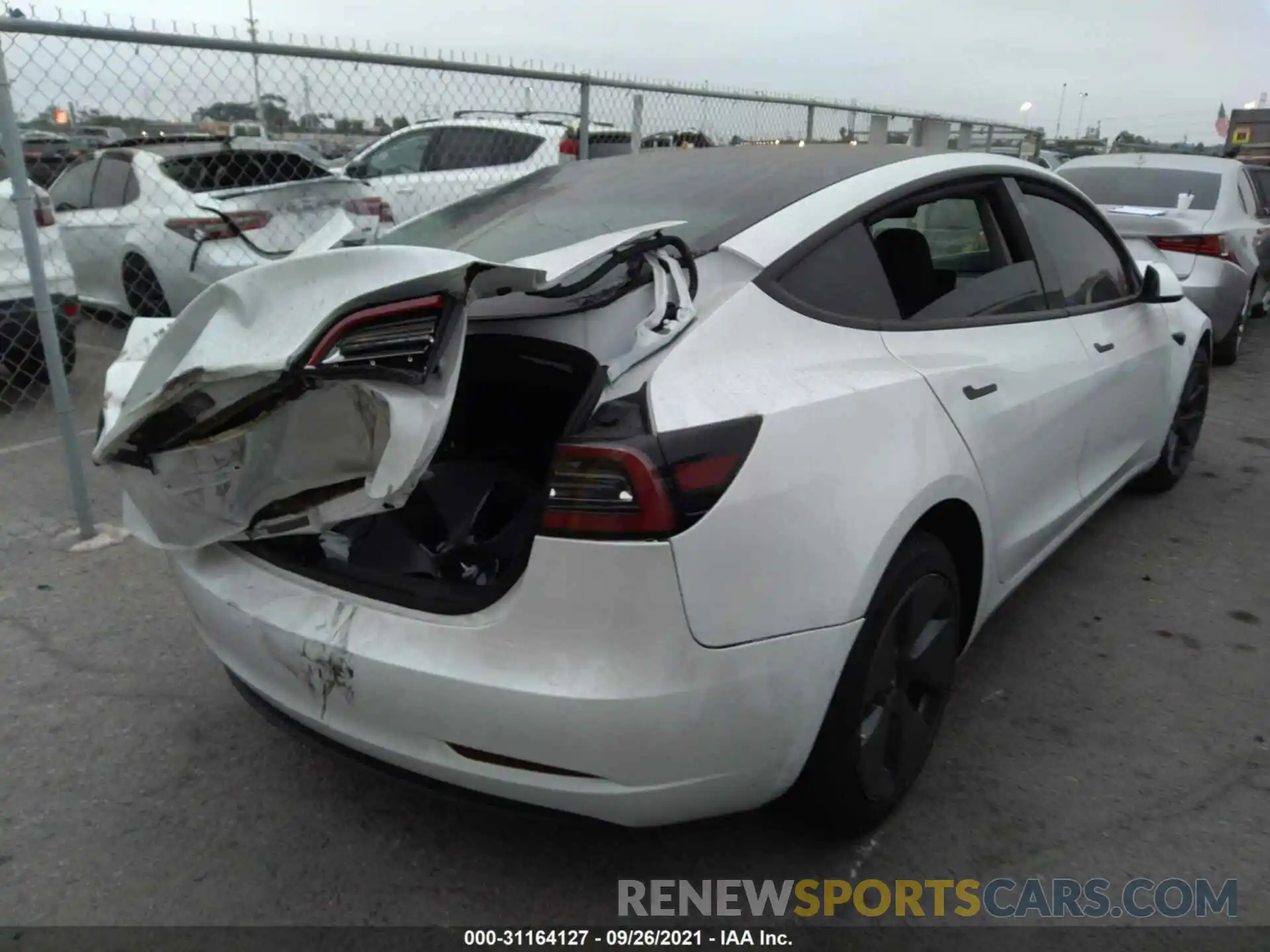 4 Фотография поврежденного автомобиля 5YJ3E1EA4MF873909 TESLA MODEL 3 2021