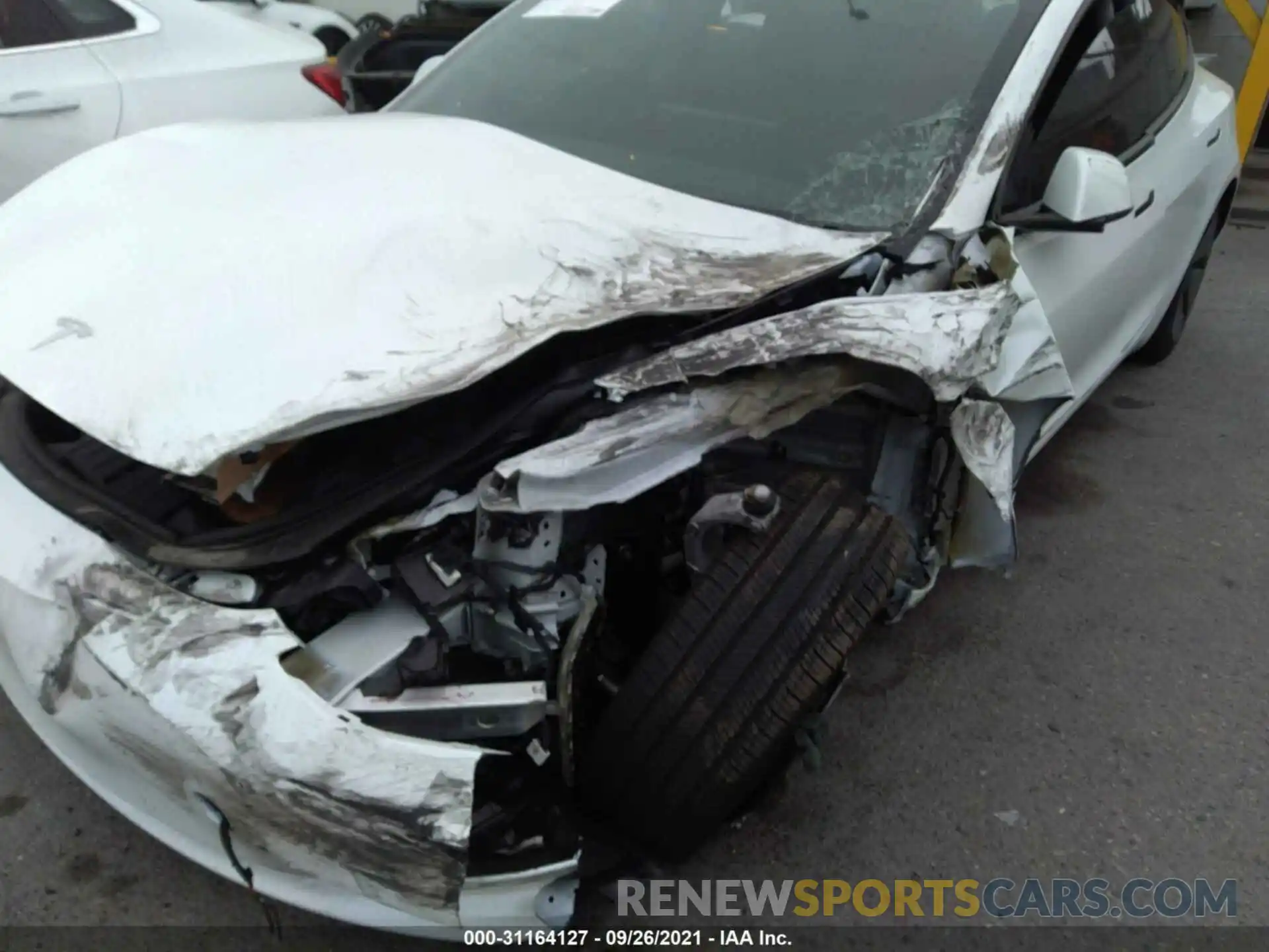 6 Photograph of a damaged car 5YJ3E1EA4MF873909 TESLA MODEL 3 2021