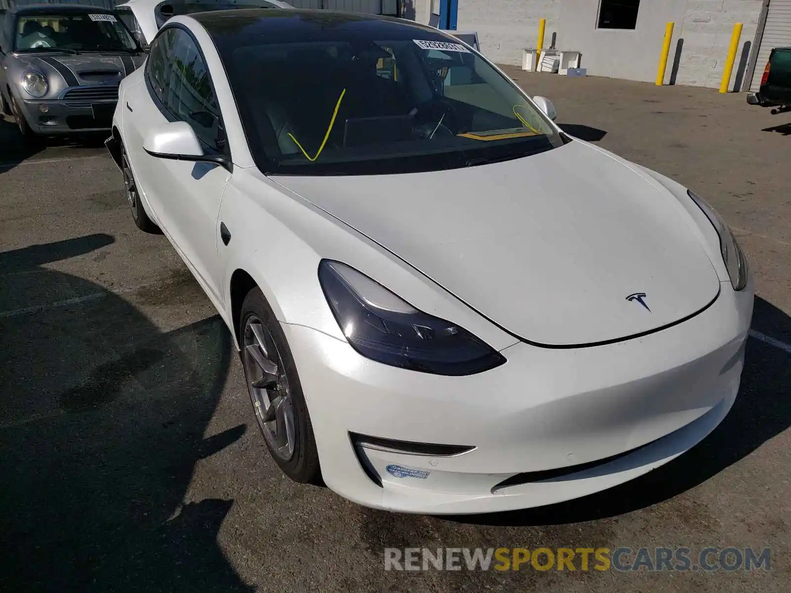 1 Photograph of a damaged car 5YJ3E1EA4MF873912 TESLA MODEL 3 2021