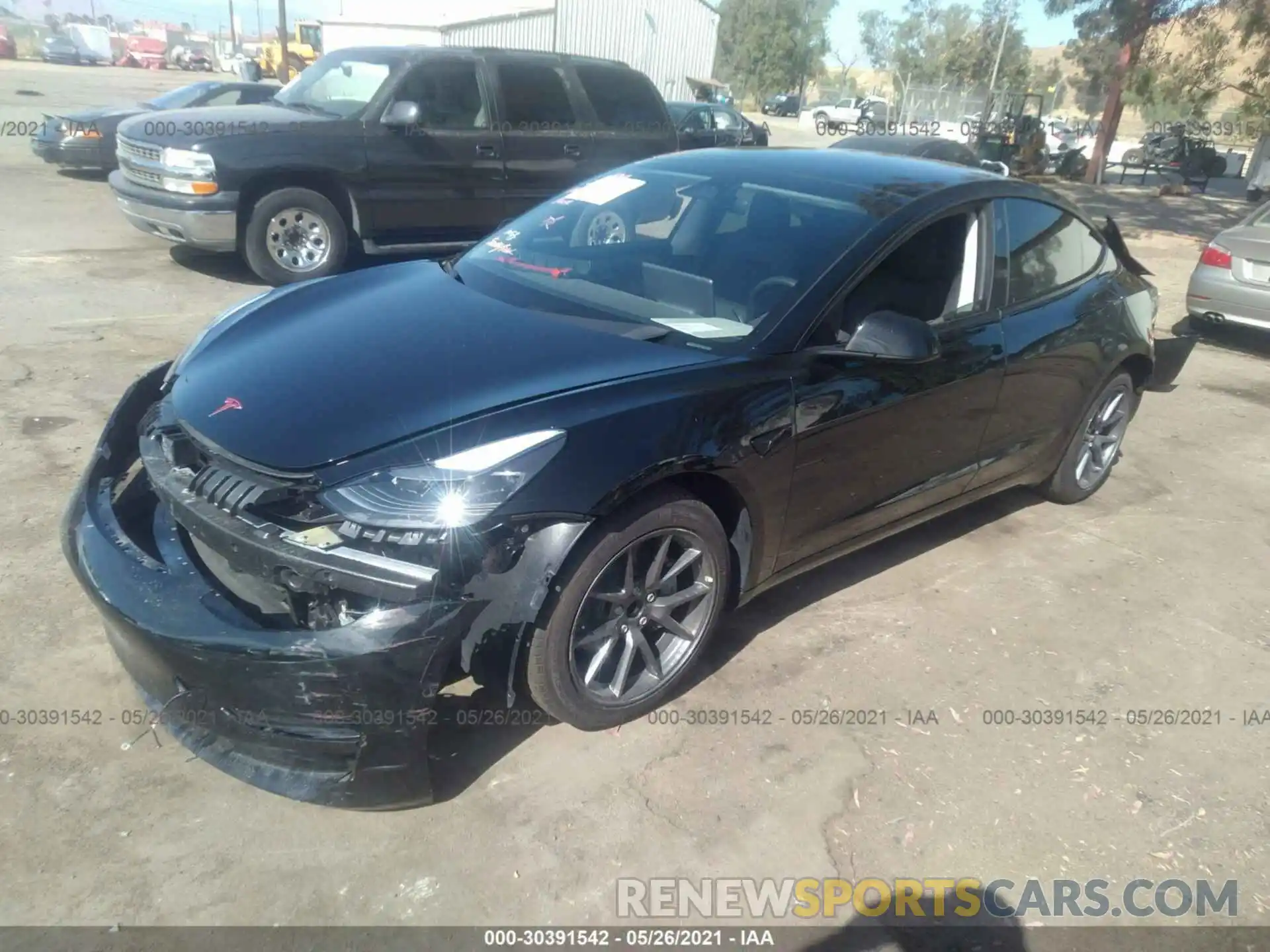 2 Photograph of a damaged car 5YJ3E1EA4MF875532 TESLA MODEL 3 2021