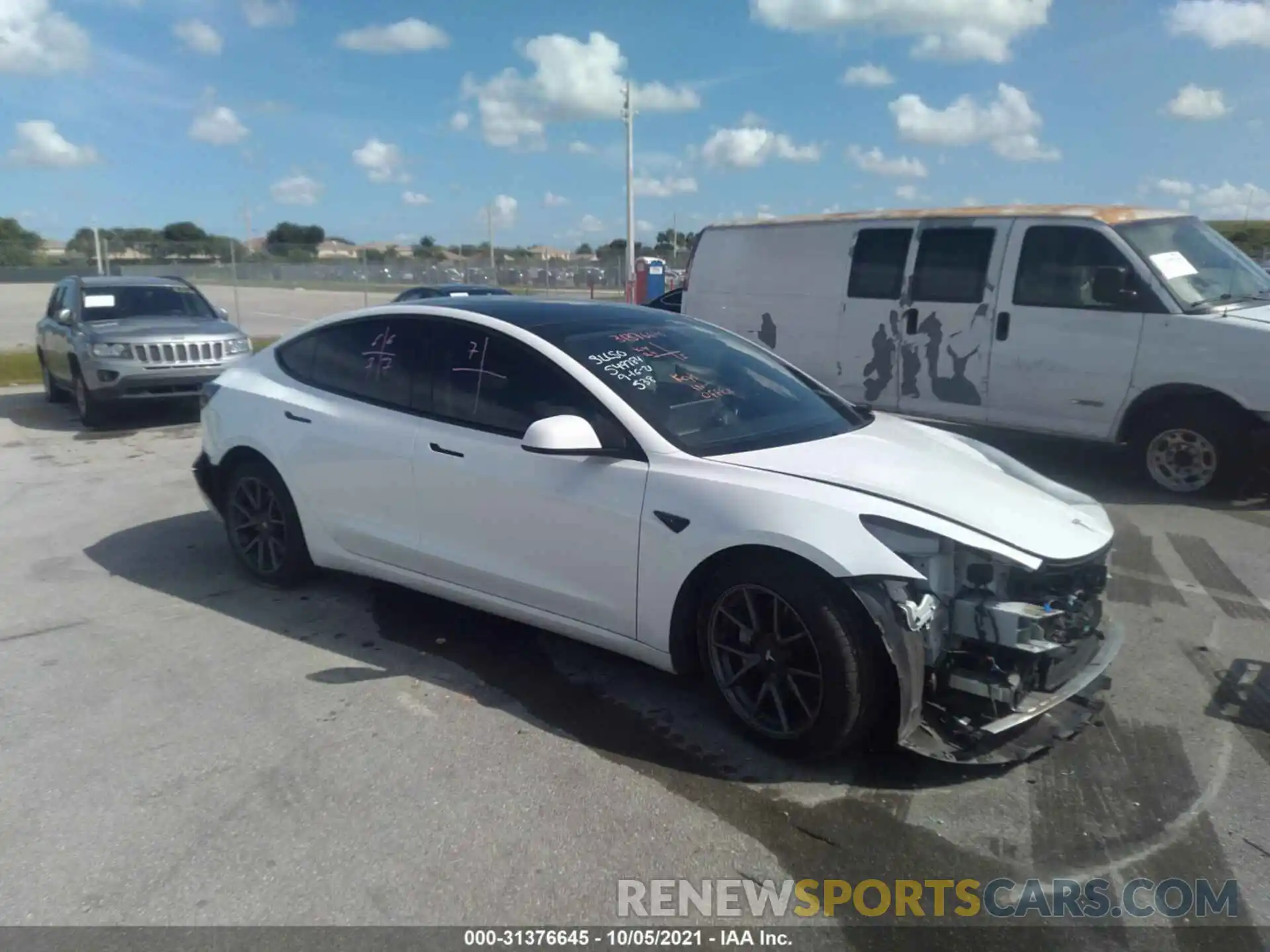 1 Photograph of a damaged car 5YJ3E1EA4MF921165 TESLA MODEL 3 2021