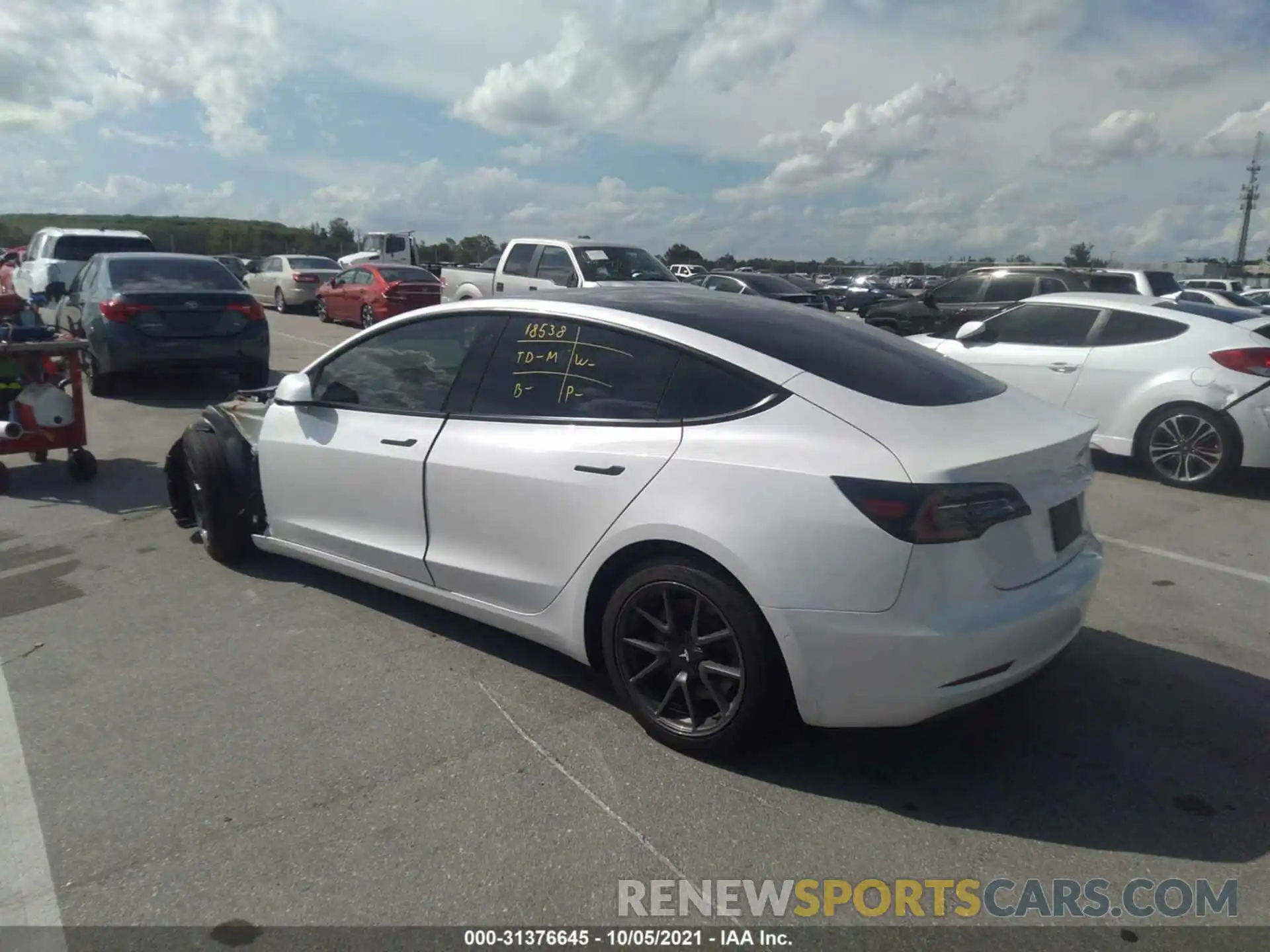 3 Photograph of a damaged car 5YJ3E1EA4MF921165 TESLA MODEL 3 2021