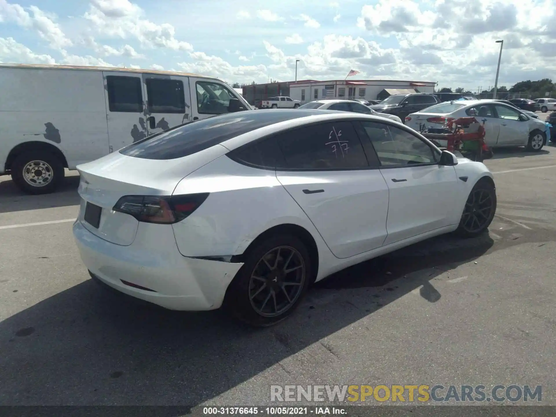 4 Photograph of a damaged car 5YJ3E1EA4MF921165 TESLA MODEL 3 2021