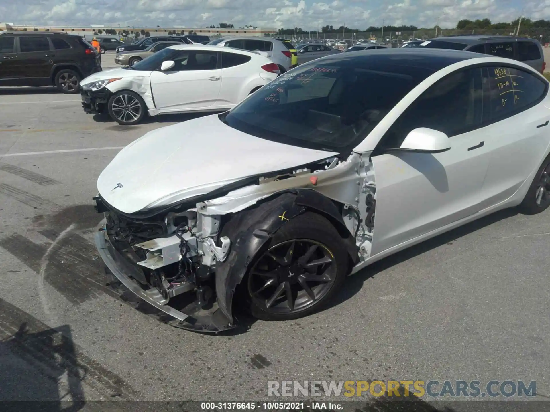 6 Photograph of a damaged car 5YJ3E1EA4MF921165 TESLA MODEL 3 2021