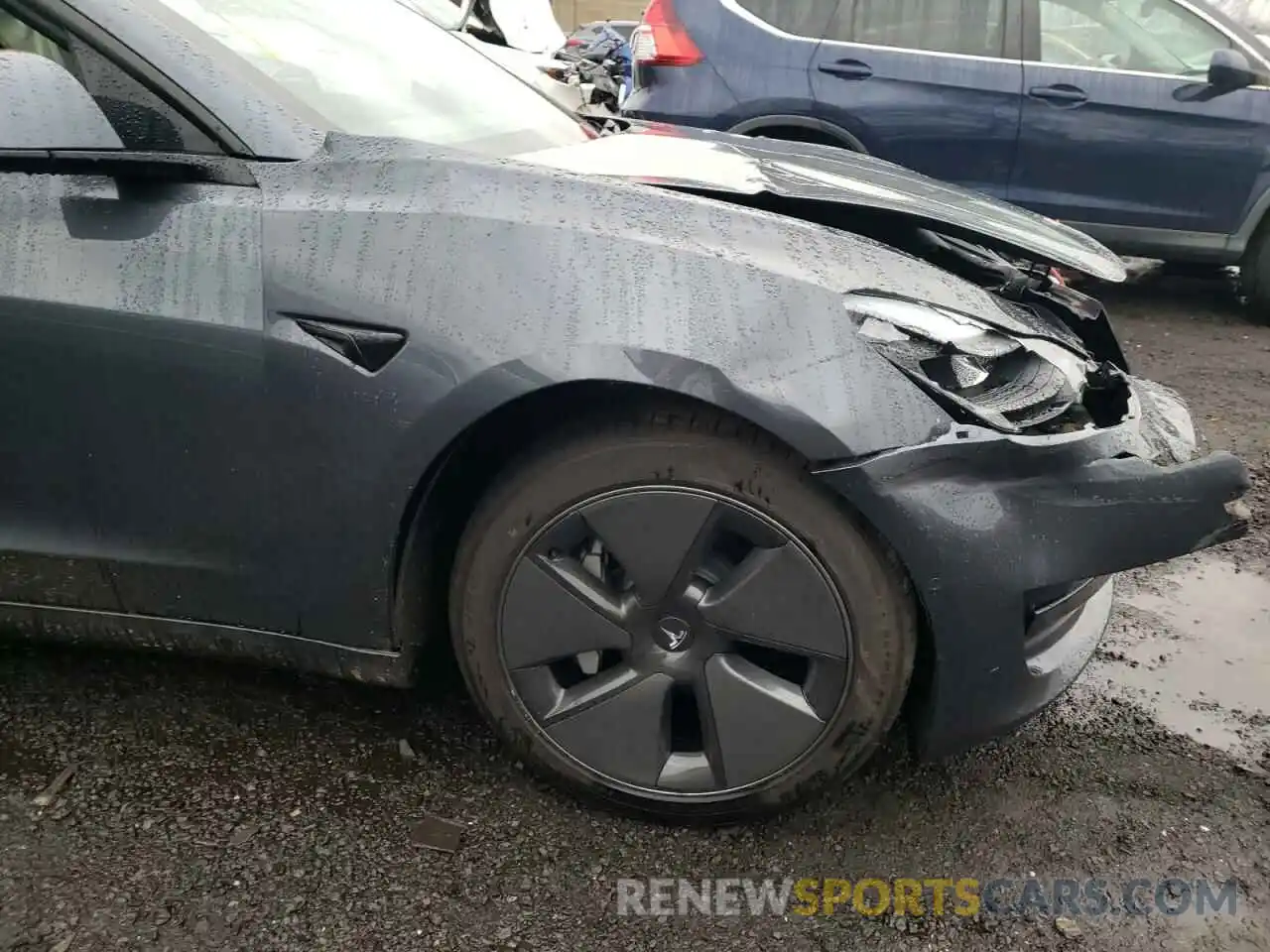 9 Photograph of a damaged car 5YJ3E1EA4MF921358 TESLA MODEL 3 2021