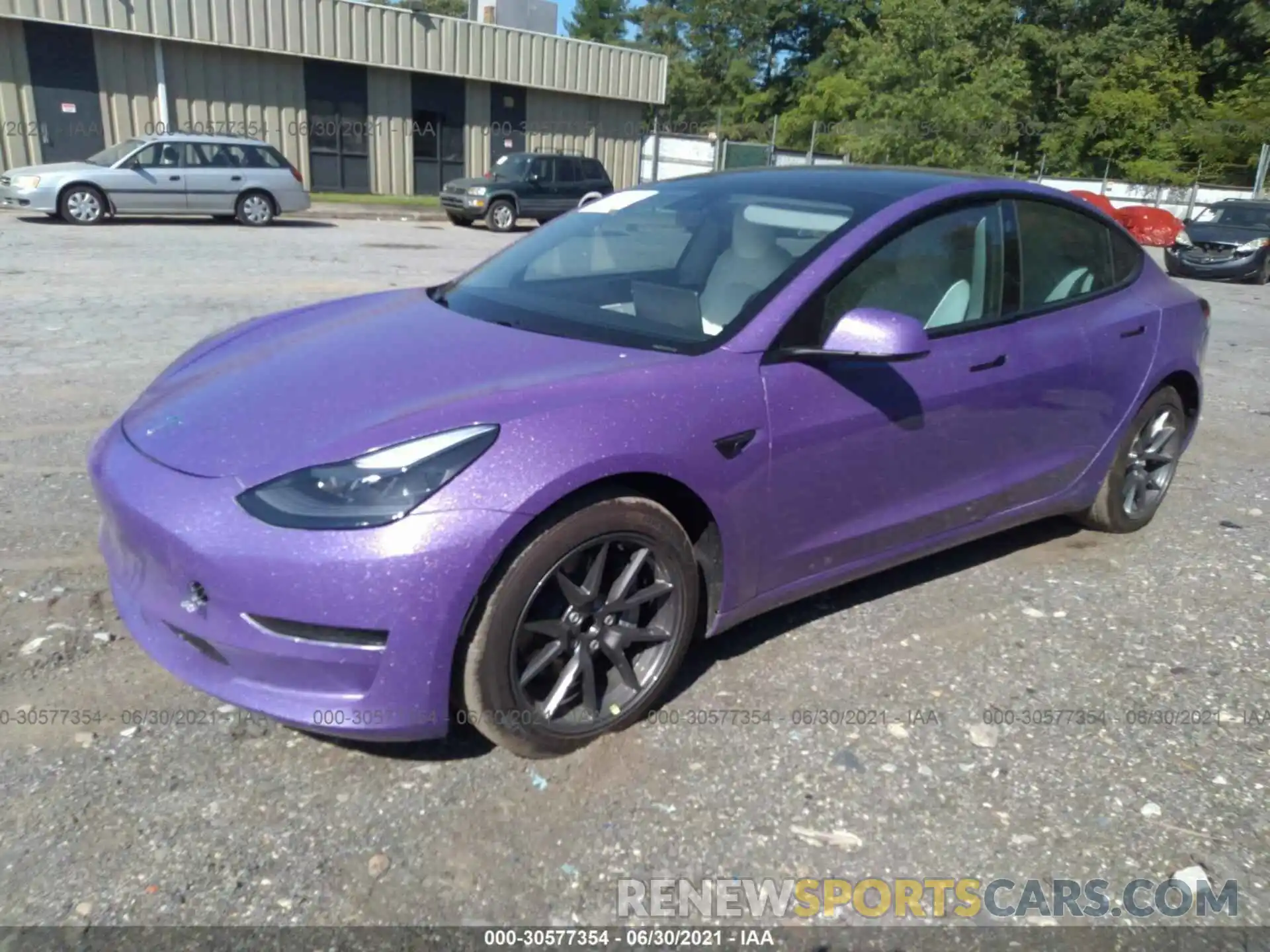 2 Photograph of a damaged car 5YJ3E1EA4MF921604 TESLA MODEL 3 2021