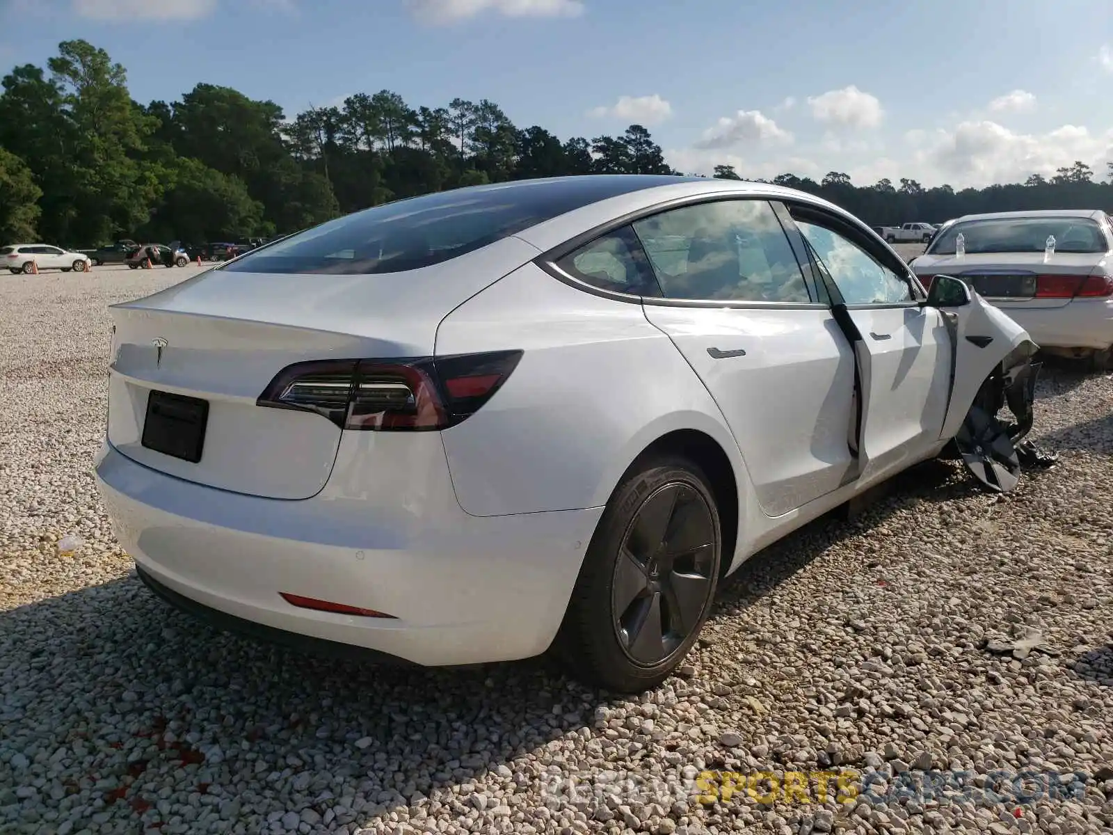 4 Photograph of a damaged car 5YJ3E1EA4MF922848 TESLA MODEL 3 2021