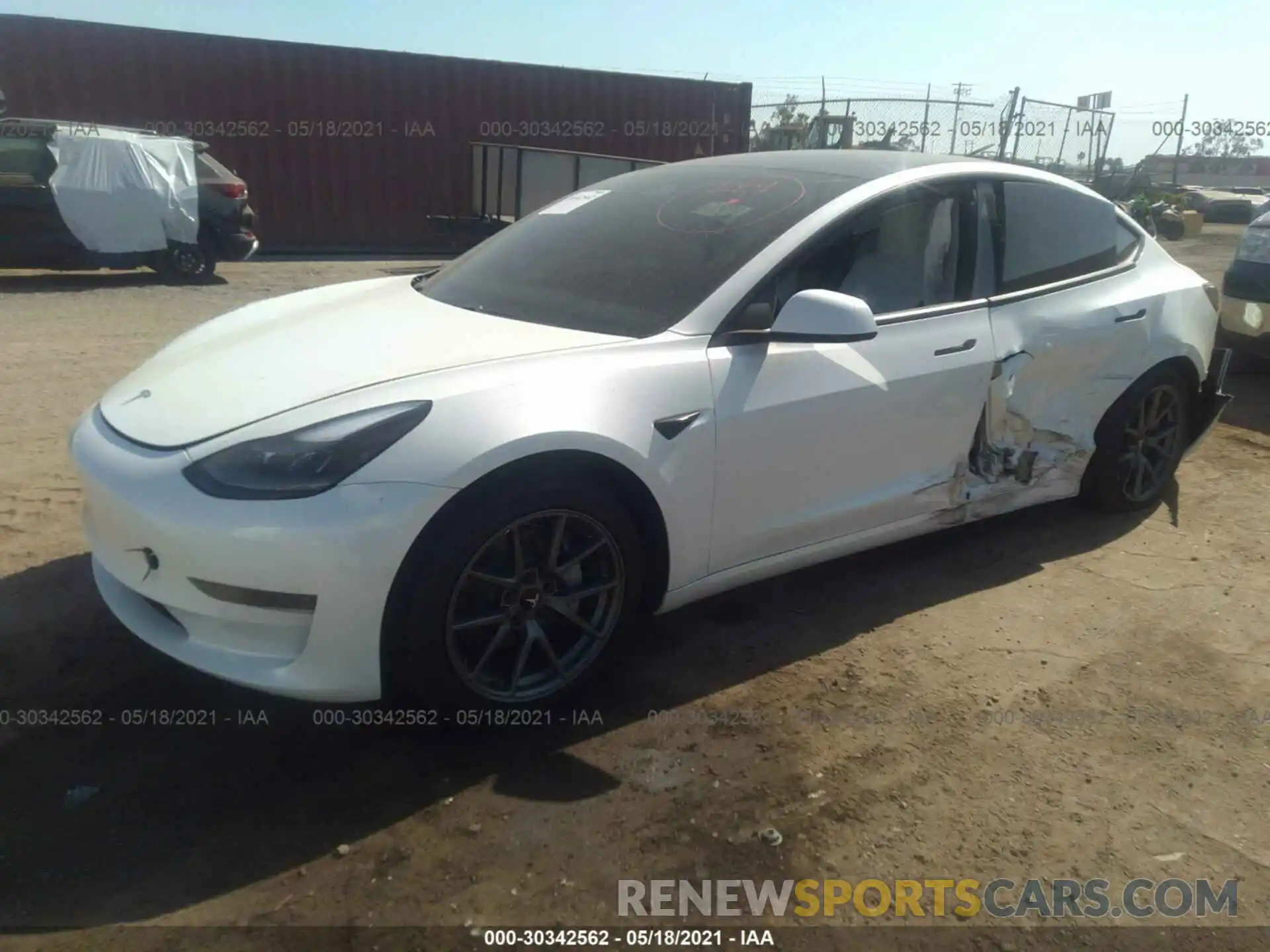 2 Photograph of a damaged car 5YJ3E1EA4MF928858 TESLA MODEL 3 2021