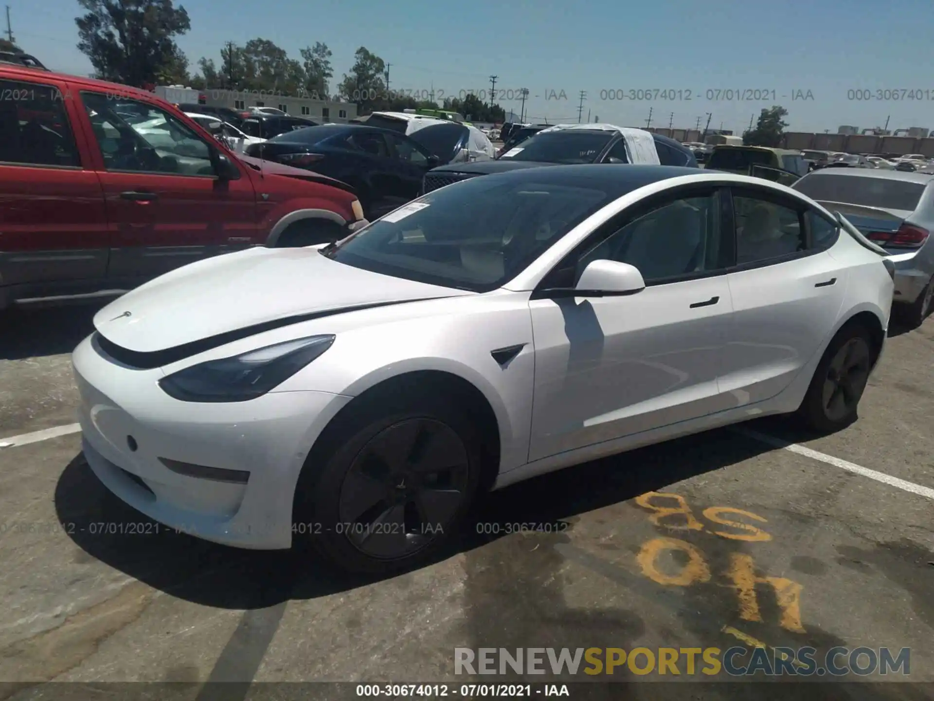 2 Photograph of a damaged car 5YJ3E1EA4MF928861 TESLA MODEL 3 2021