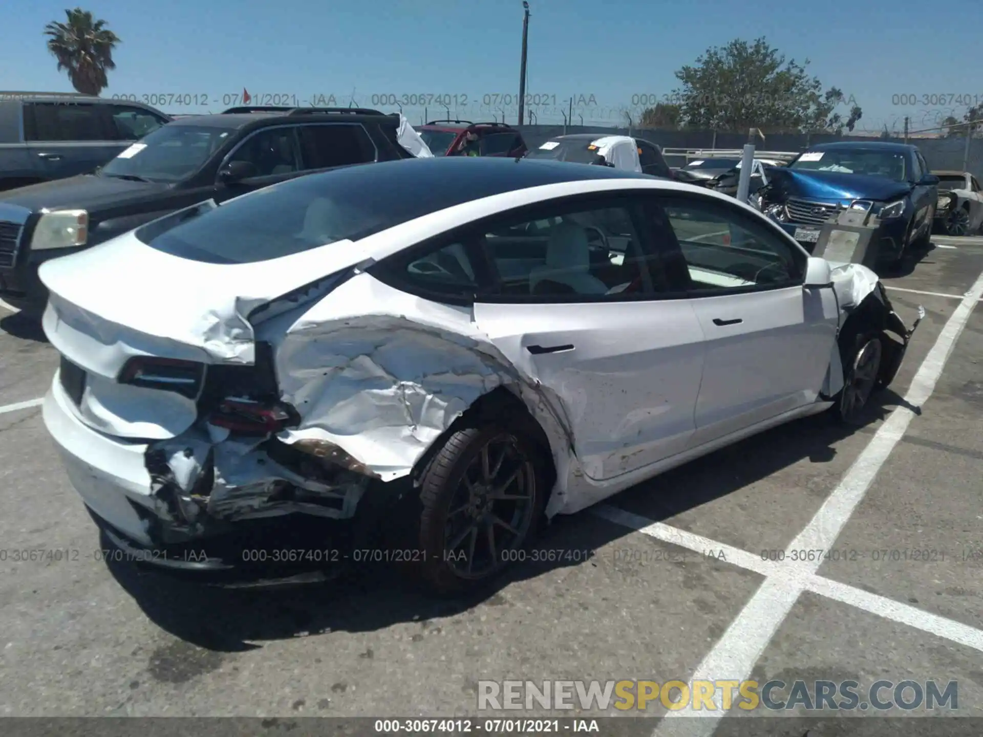 4 Photograph of a damaged car 5YJ3E1EA4MF928861 TESLA MODEL 3 2021