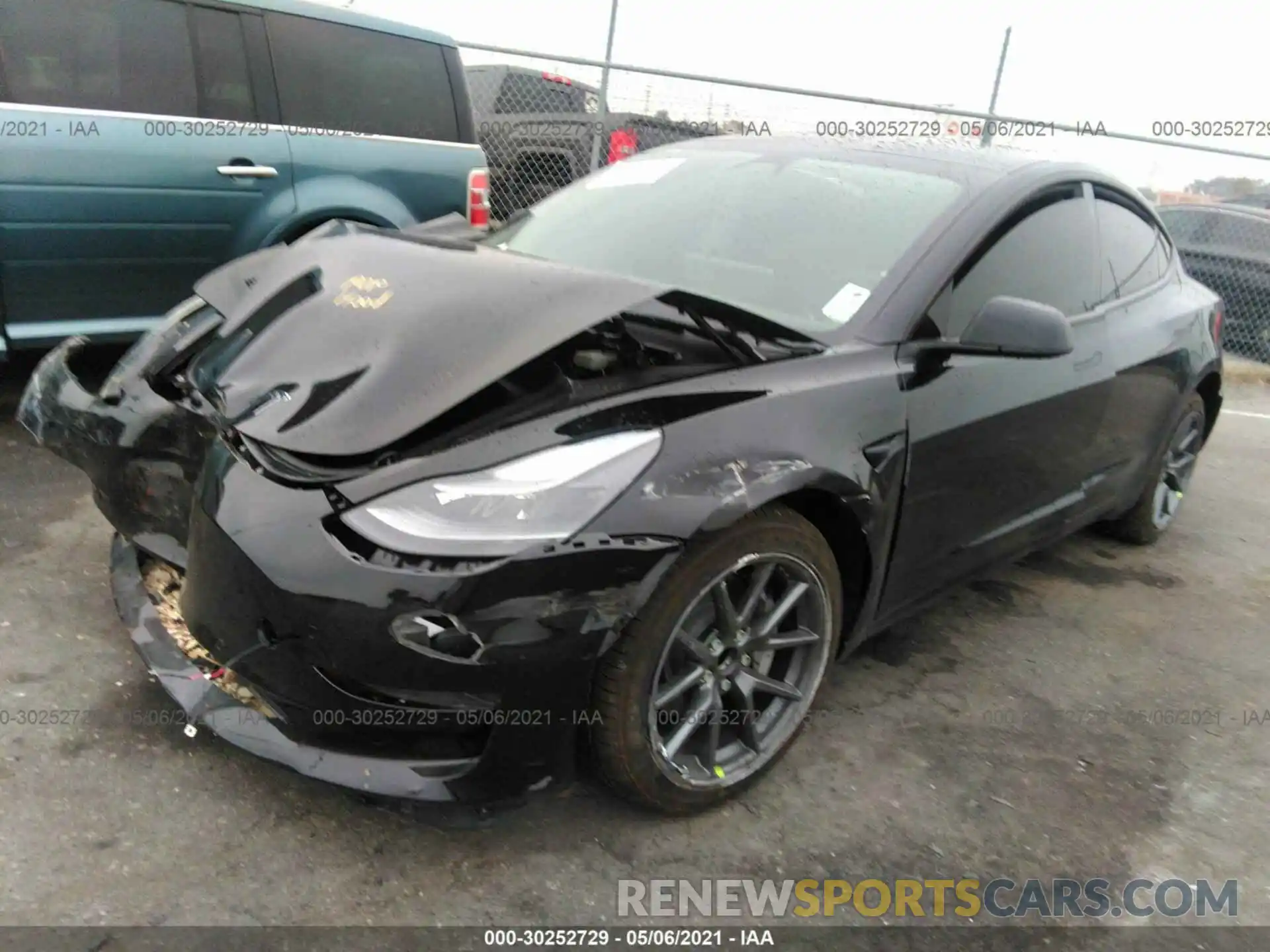 2 Photograph of a damaged car 5YJ3E1EA4MF939259 TESLA MODEL 3 2021