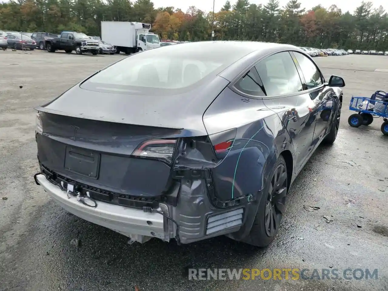 4 Photograph of a damaged car 5YJ3E1EA4MF969023 TESLA MODEL 3 2021