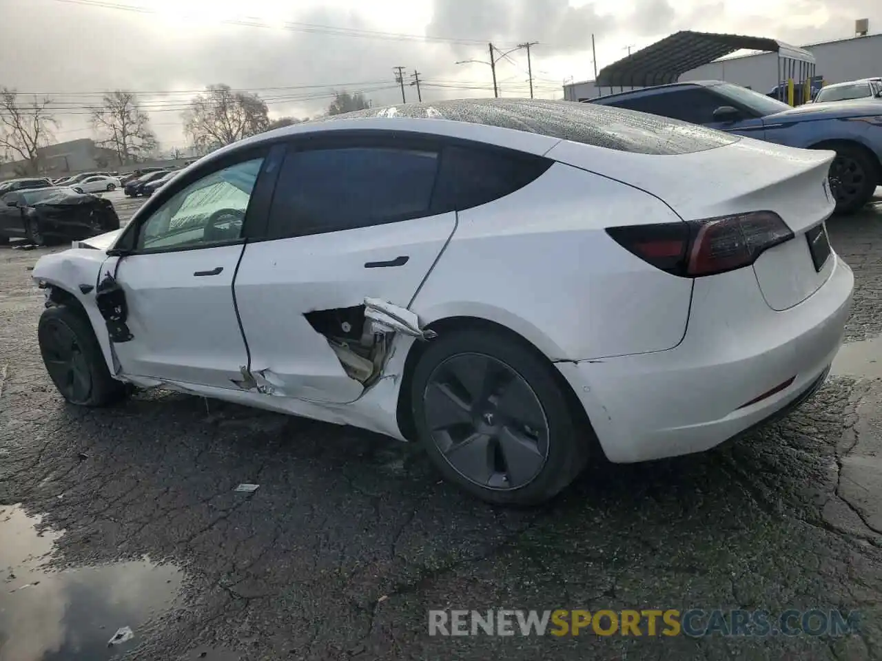 2 Photograph of a damaged car 5YJ3E1EA4MF976862 TESLA MODEL 3 2021