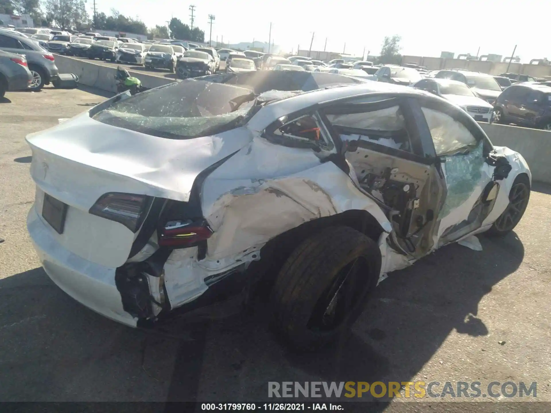 4 Photograph of a damaged car 5YJ3E1EA4MF982144 TESLA MODEL 3 2021